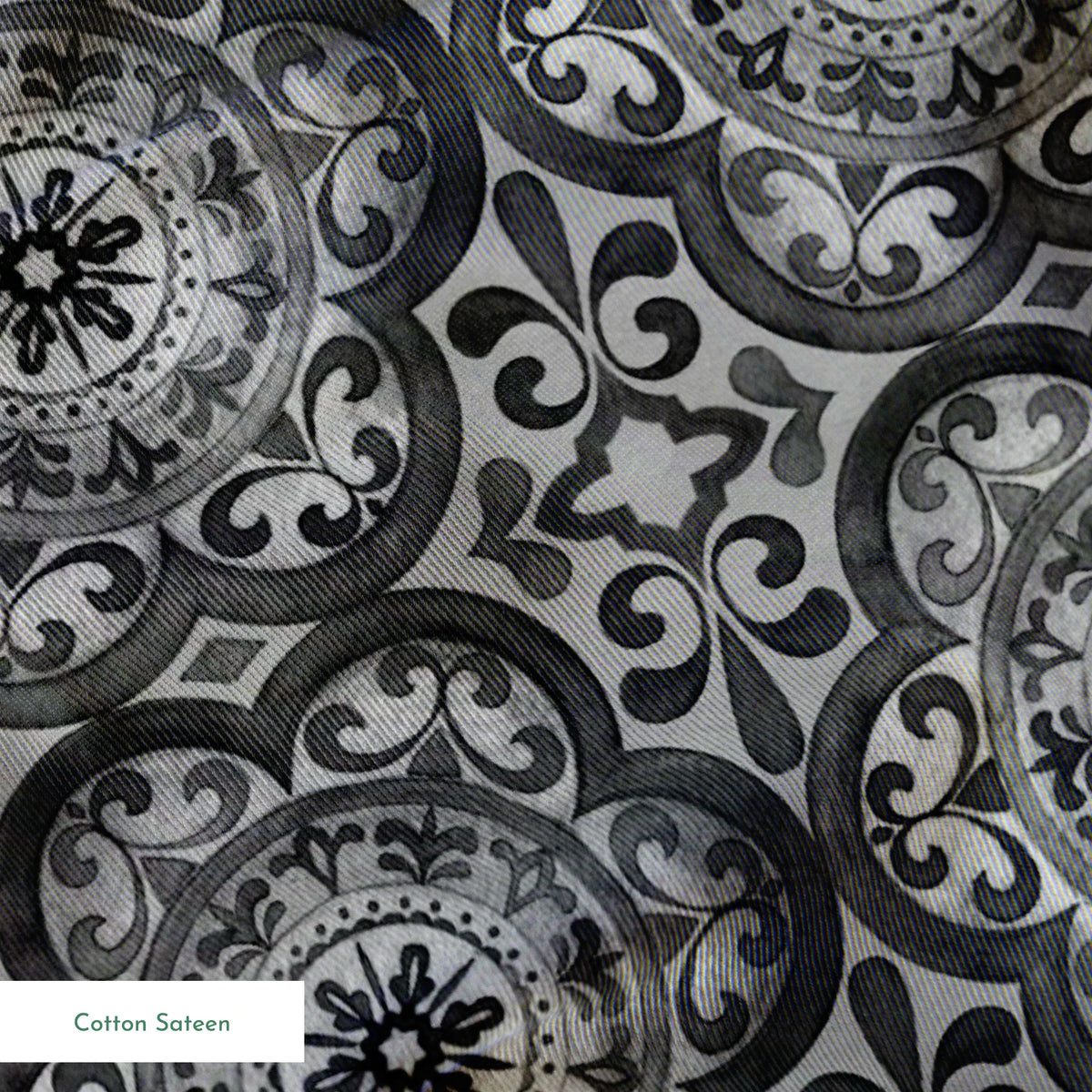 Grayscale medallion tile pattern with floral and scroll motifs in a symmetrical layout by Nicole Tamarin. springs sateen texture