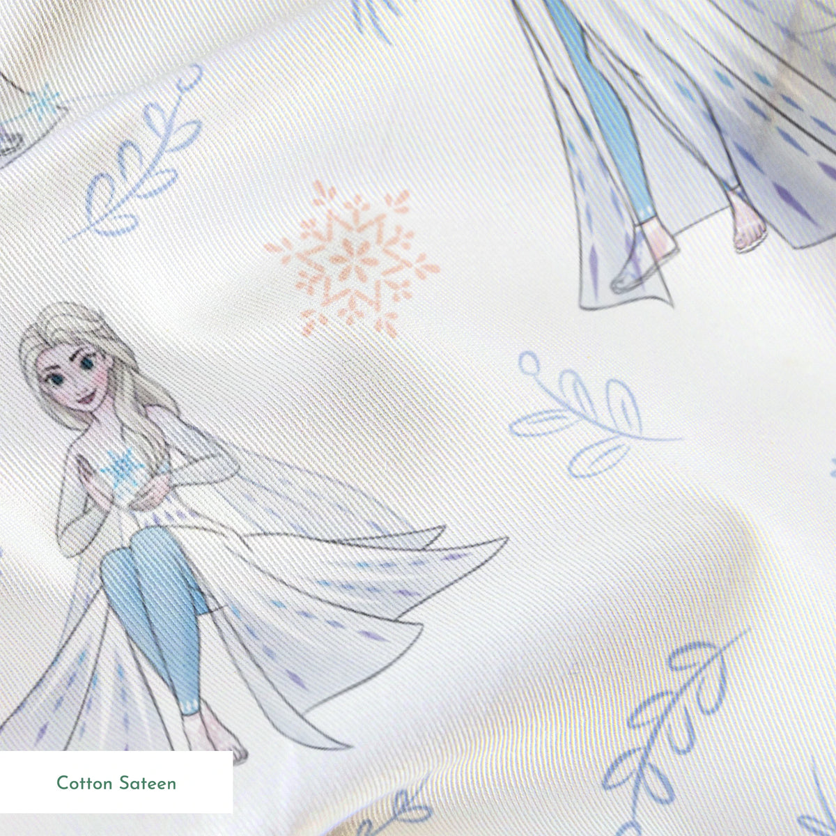 The image shows a decorative pattern featuringFrozen's Elsa, surrounded by delicate snowflakes, leaves, and floral elements in soft pastel colors on a light background. springs sateen texture