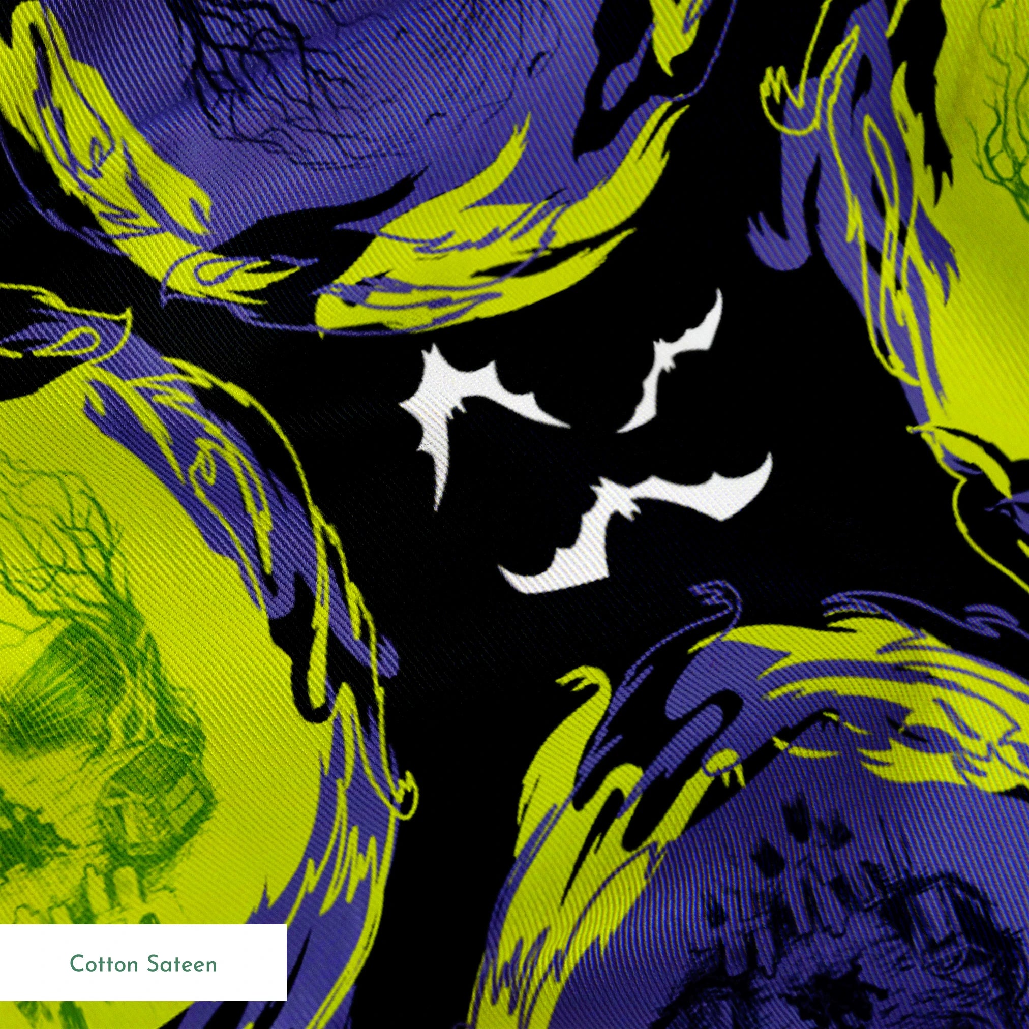 Repeating pattern of neon green and purple skulls with swirling effects on black background with white bats springs sateen texture