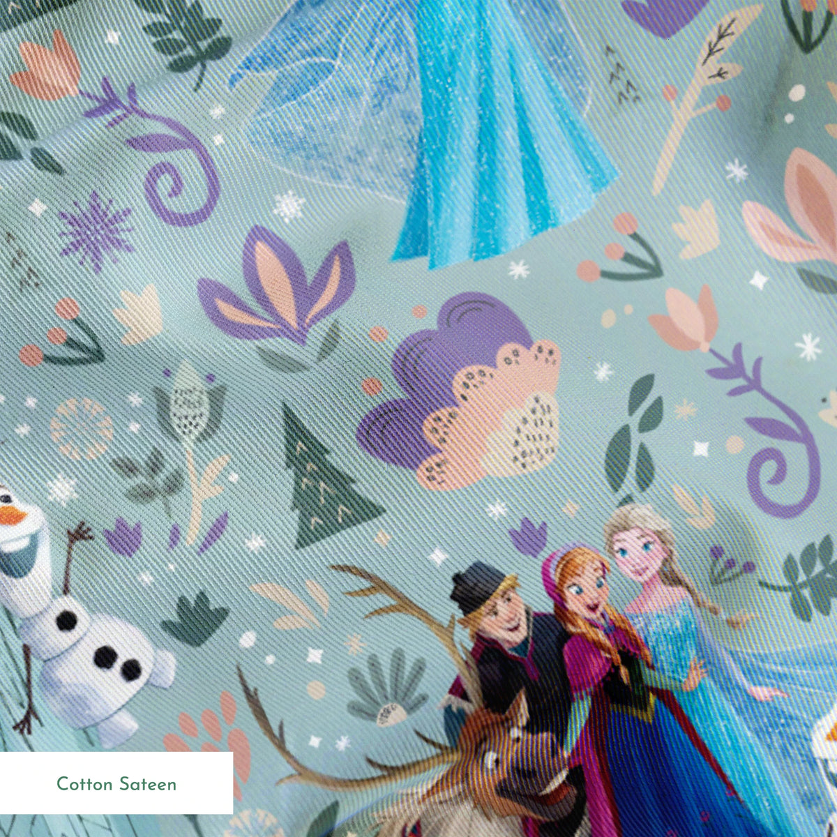 Frozen-themed pattern with the iconic characters, snowmen, flowers, and swirls on a light blue background springs sateen texture