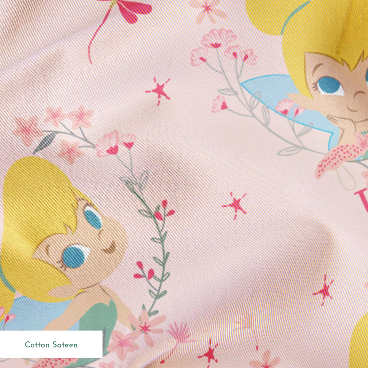 Pink background with Tinker Bell surrounded by flowers, stars, and dragonflies springs sateen texture