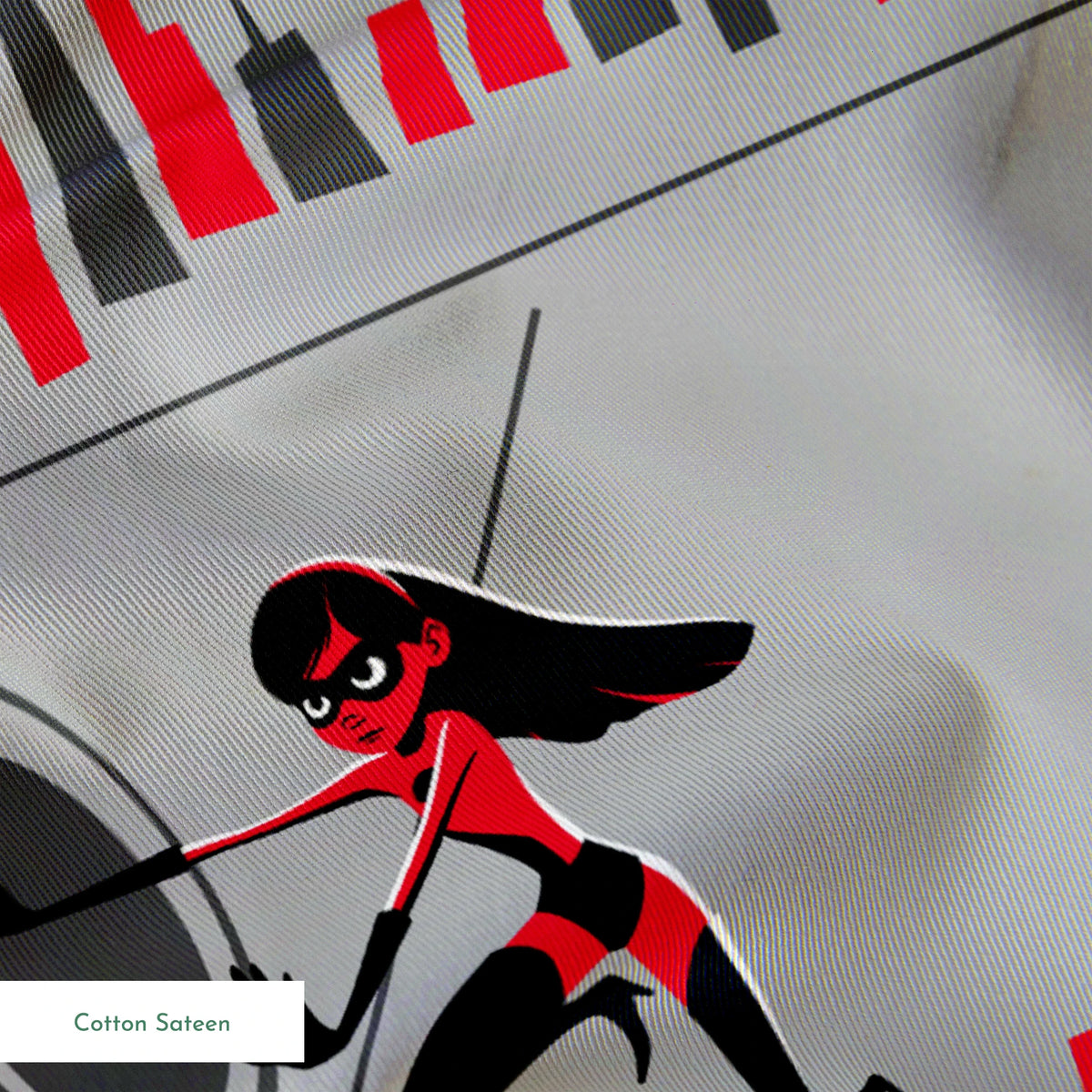 Characters in red and black superhero outfits from The Incredibles shown in action poses against gray background with city elements springs sateen texture