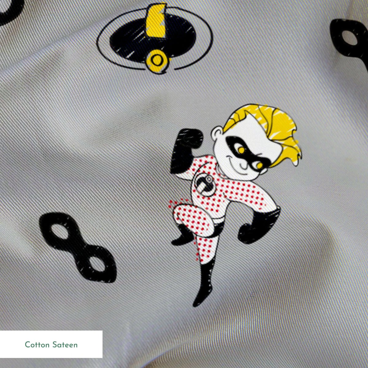 The Incredibles in black and white suits with yellow emblems scattered on gray background with masks springs sateen texture