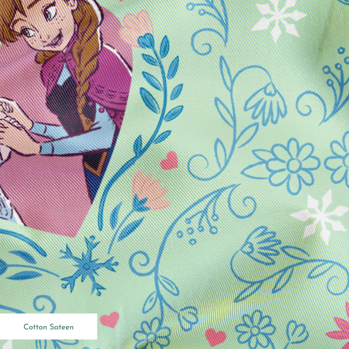 Disney Frozen Sisterly Bond on Green Fabric