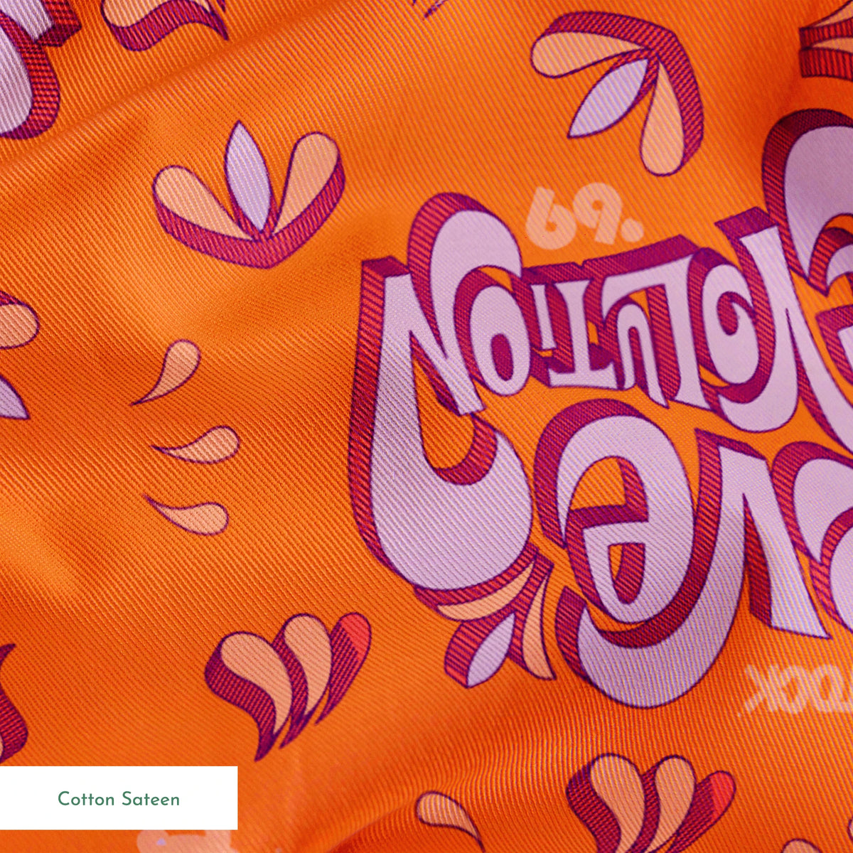 Woodstock Love Revolution on Orange Fabric