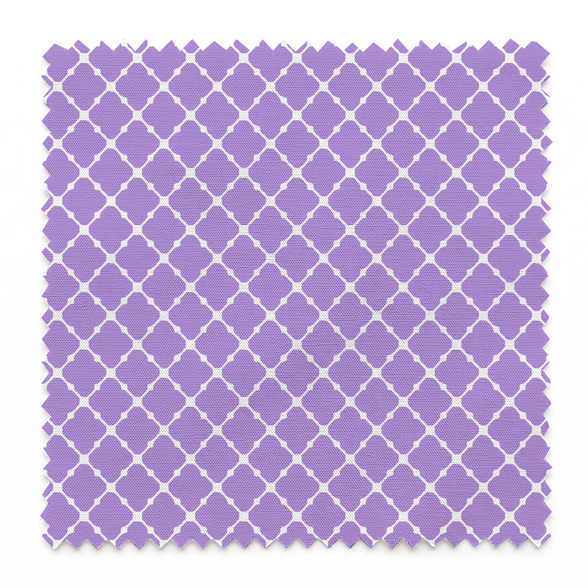 Purple quatrefoil pattern with white lattice grid on lavender background springs swatch pinked