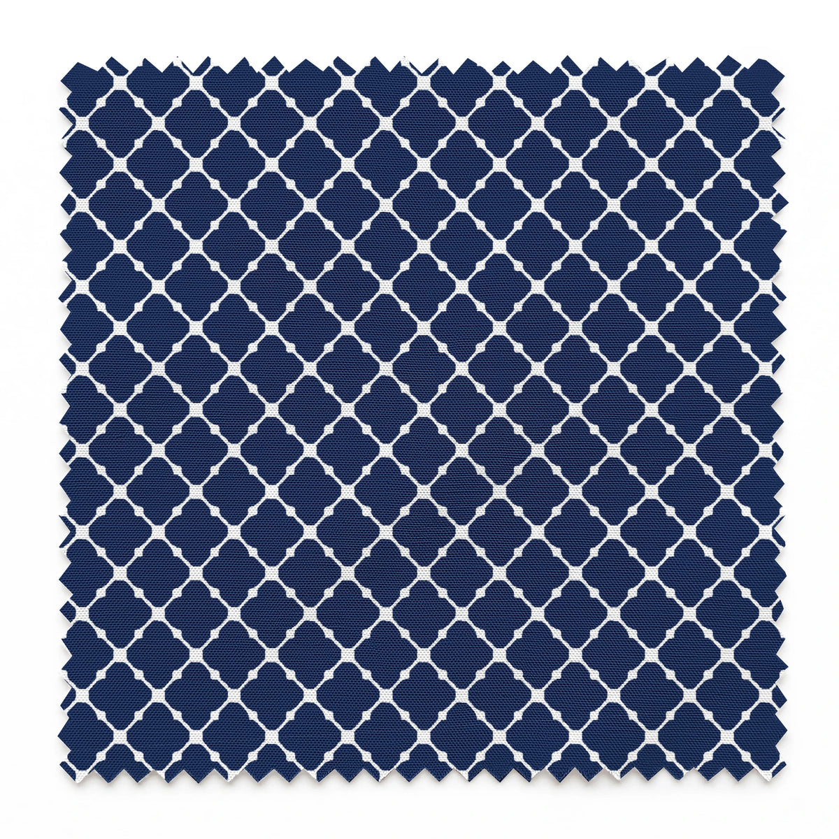 Navy blue quatrefoil pattern with white lattice design on dark background springs swatch pinked