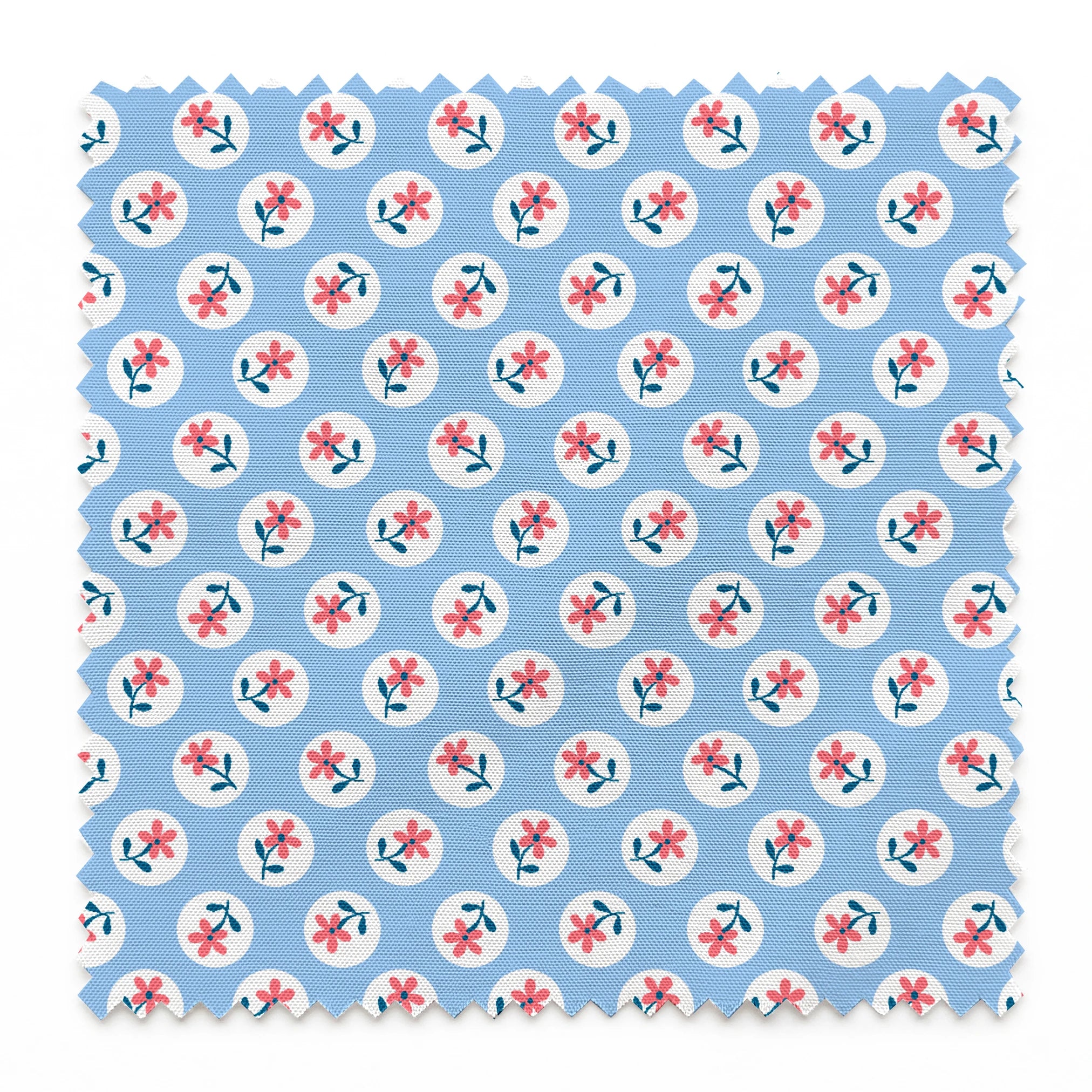 Pink flowers with blue-green stems in white circles on pale blue background, repeating pattern springs swatch pinked
