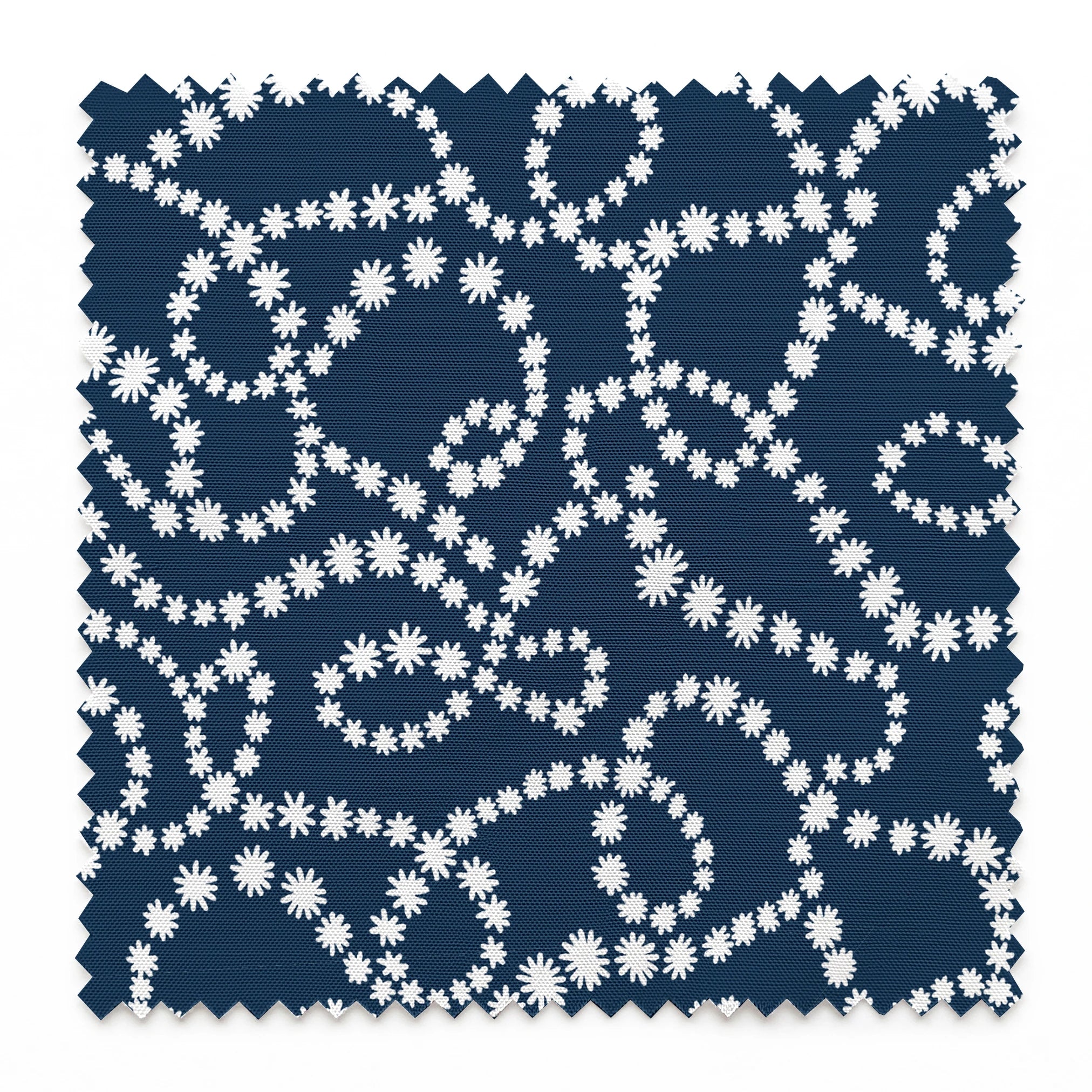 Navy blue background with swirling white dotted patterns creating circular and flowing designs springs swatch pinked
