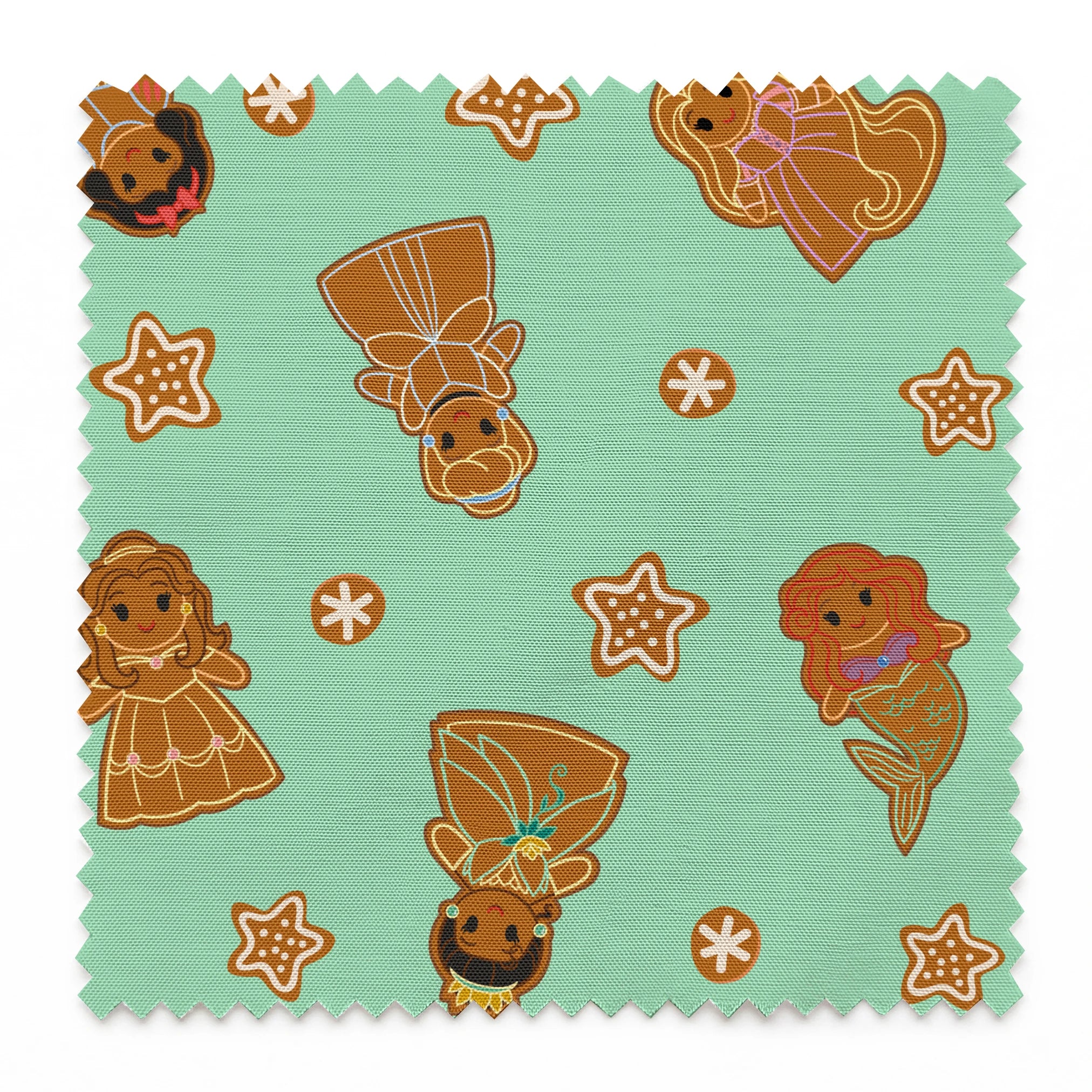 Disney Princess gingerbread cookies with star and snowflake designs on mint green background springs swatch pinked