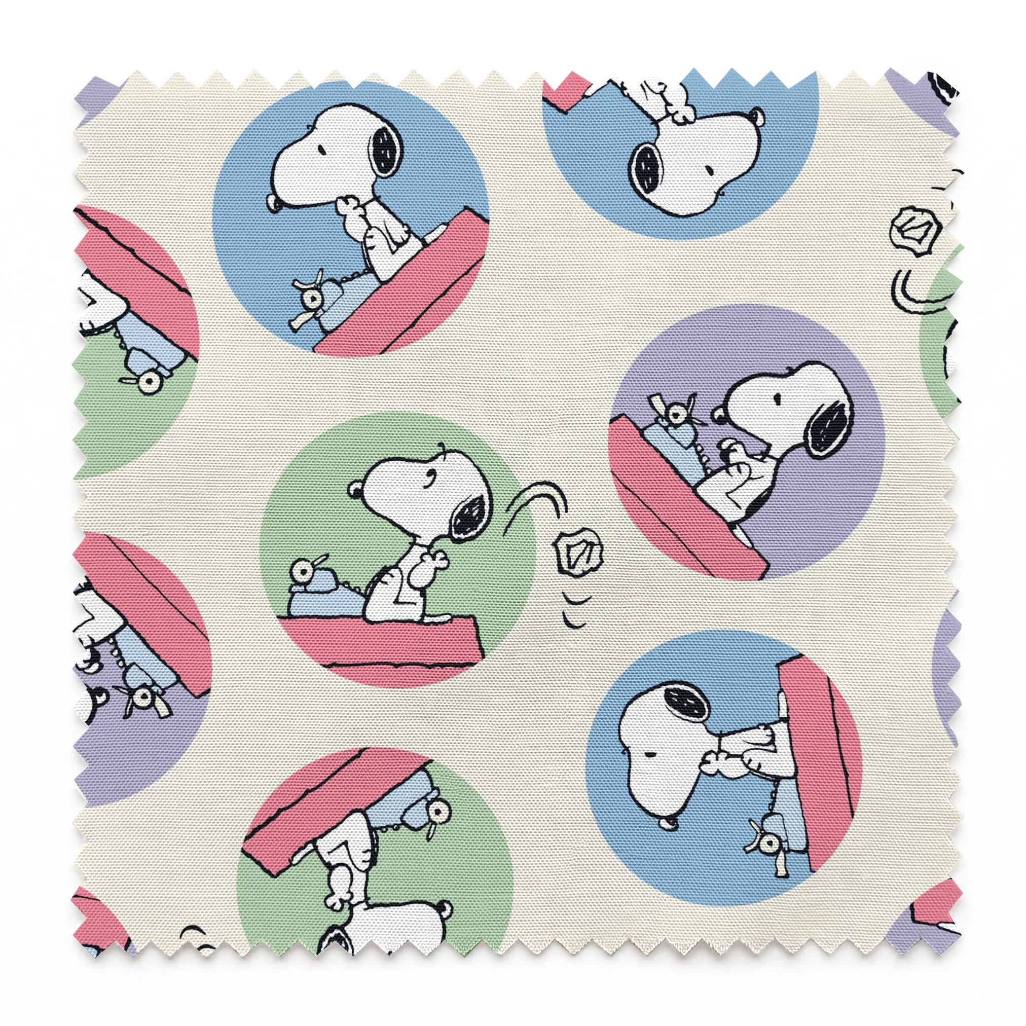 Cartoon Snoopy pattern with the beagle character in circular frames of blue, green, and purple backgrounds springs swatch pinked