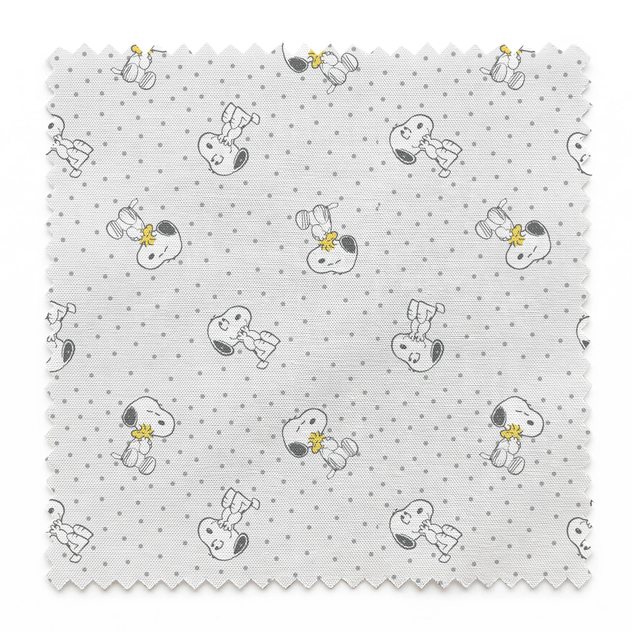 Snoopy and Woodstock on polka dot background in a repeating pattern springs swatch pinked