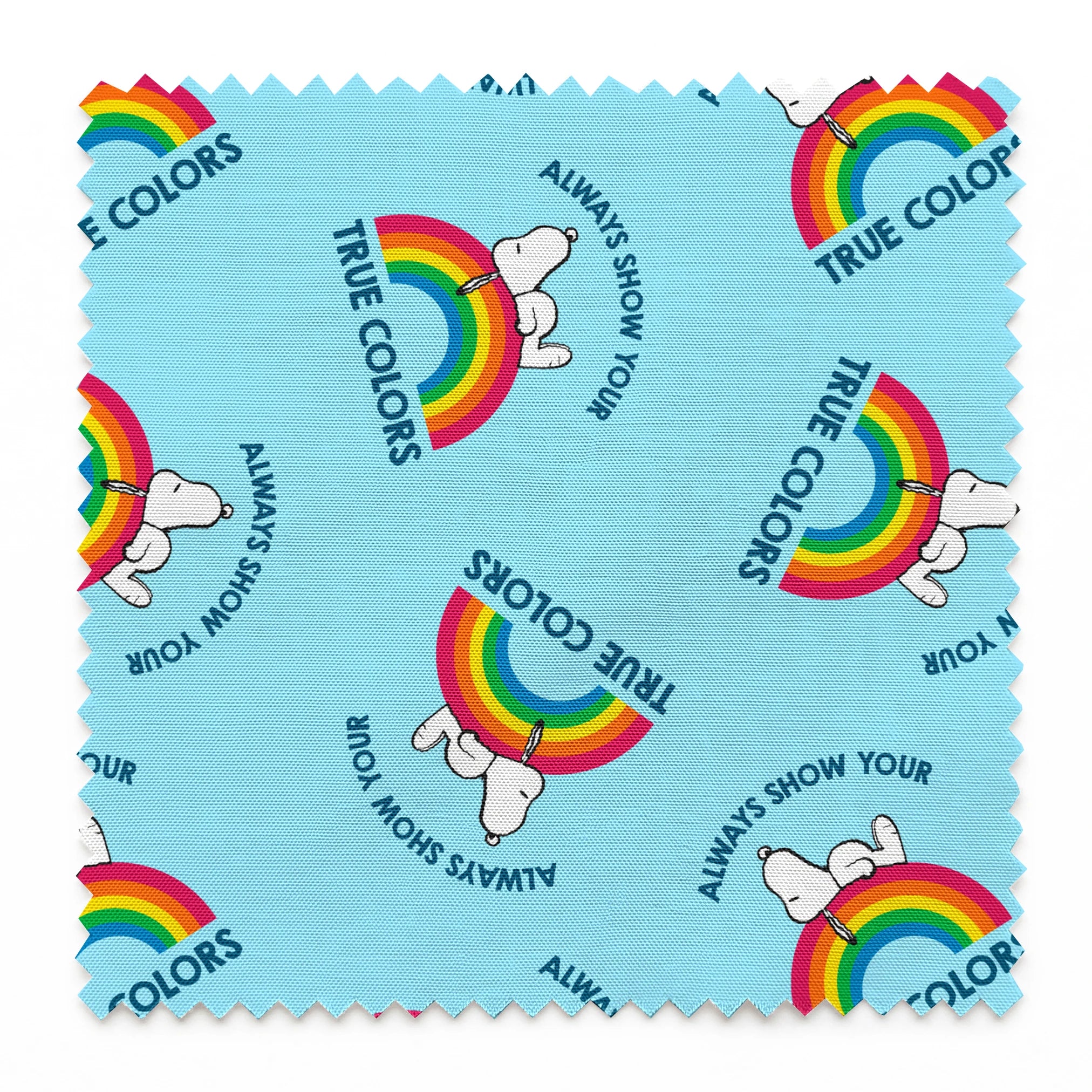 Rainbow Snoopy pattern on light blue background with white clouds and "TRUE COLORS" and "ALWAYS SHOW YOUR" text repeated throughout design springs swatch pinked