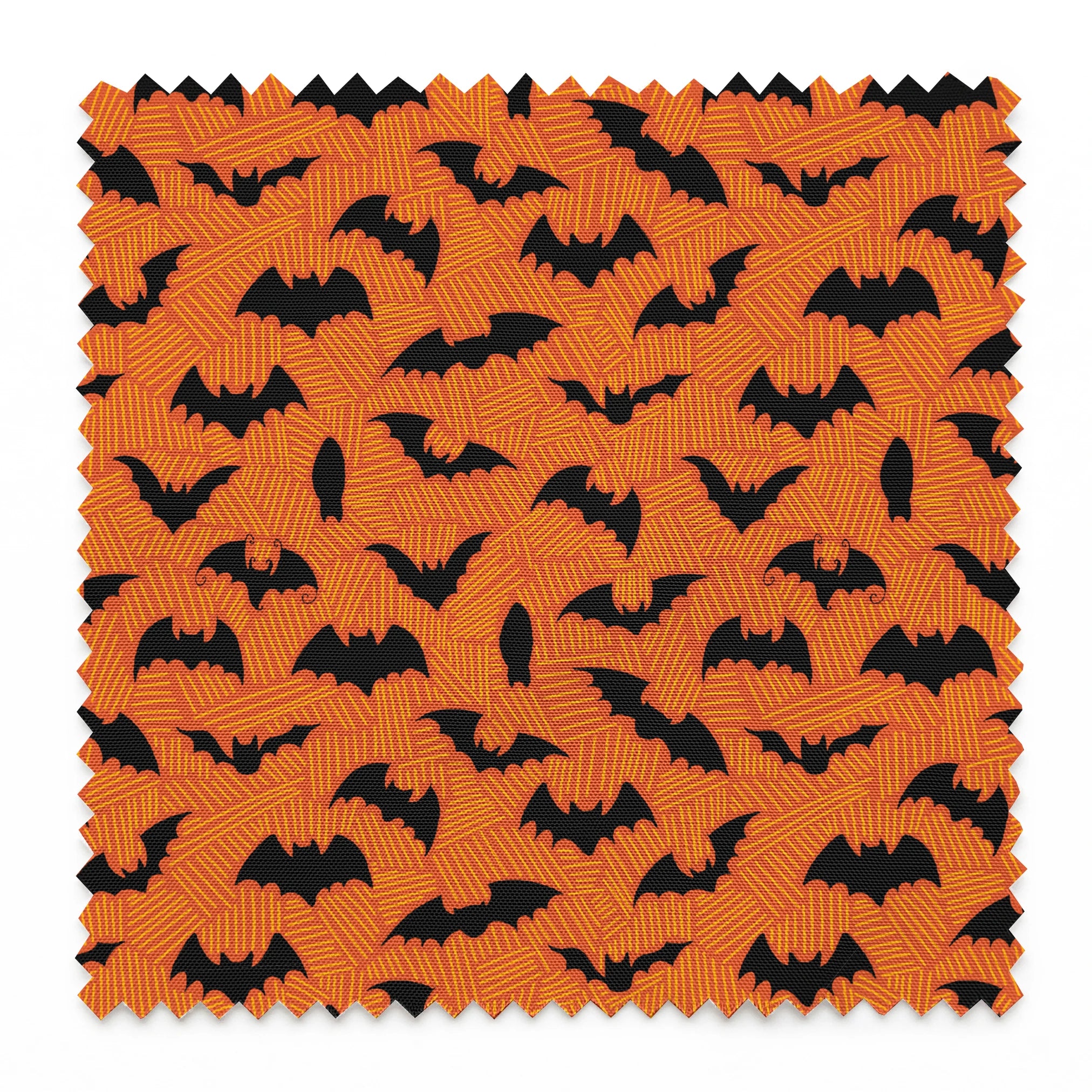 Halloween pattern with black bats scattered across an orange textured background springs swatch pinked