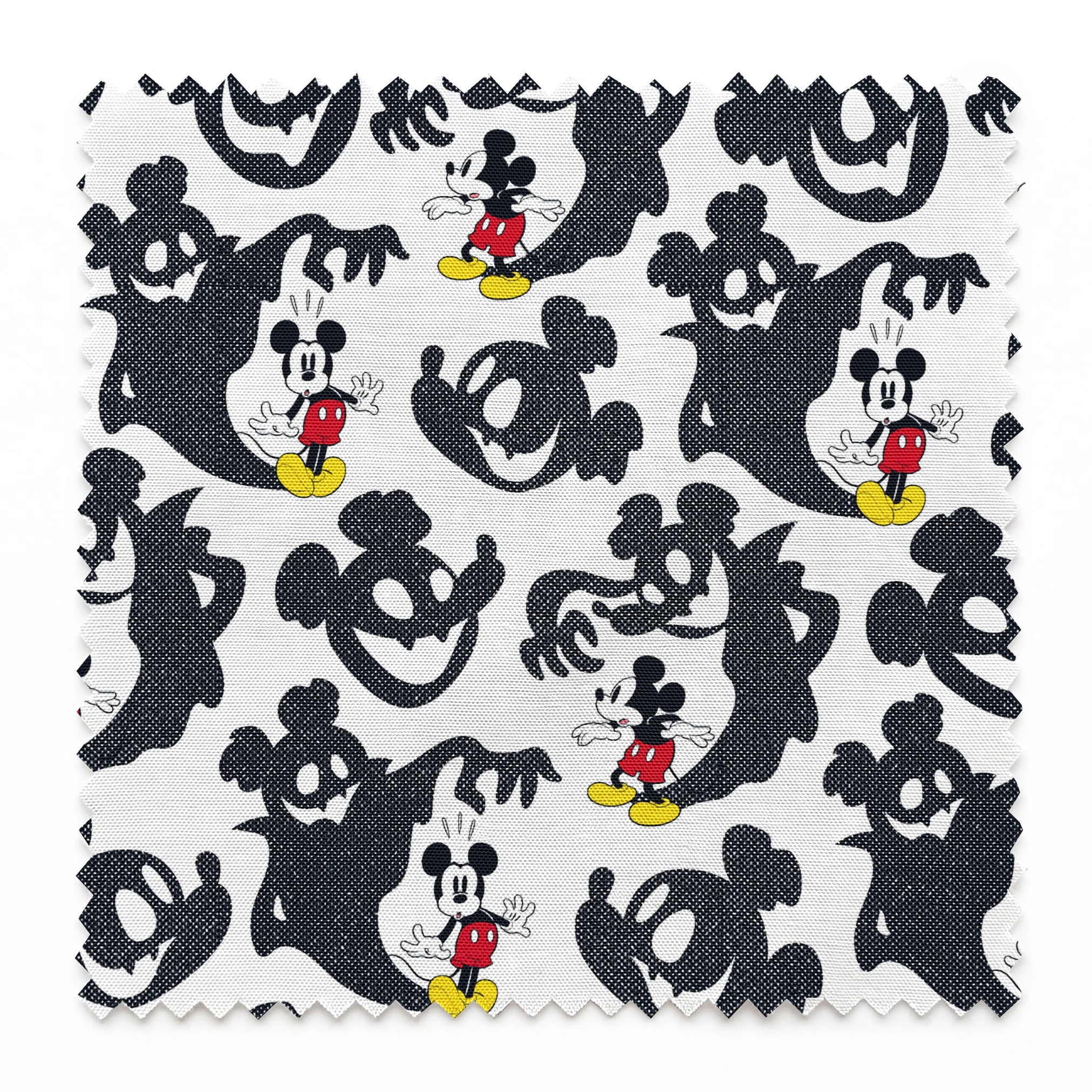 Mickey Mouse pattern with black ghost silhouettes on white background springs swatch pinked