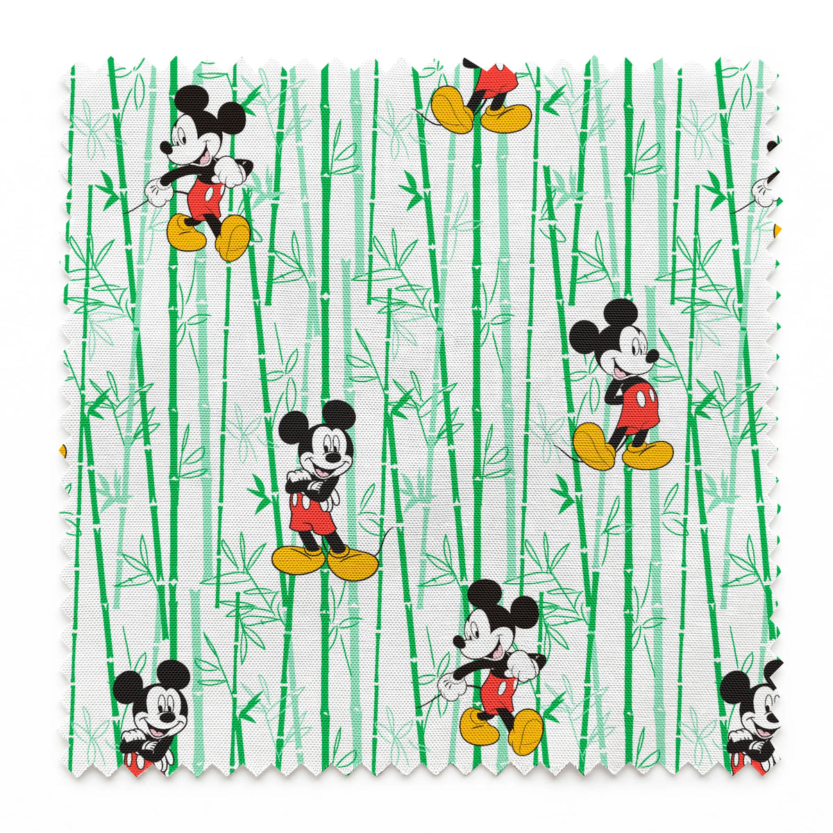 Cartoon mouse character pattern on white background with green vertical stripes springs swatch pinked