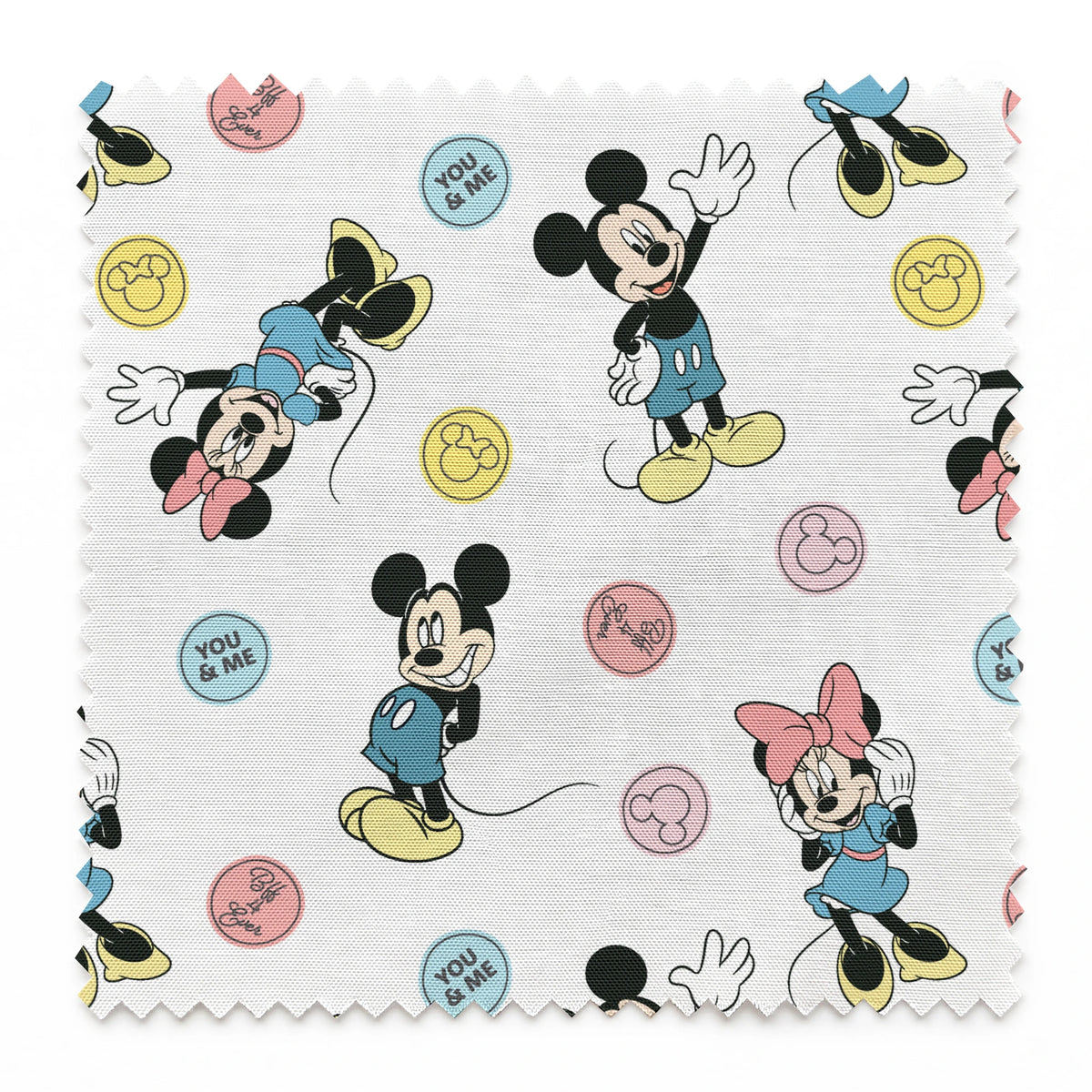 Mickey Mouse and Minnie Mouse cartoon pattern with colorful circles containing phrases on white background. springs swatch pinked