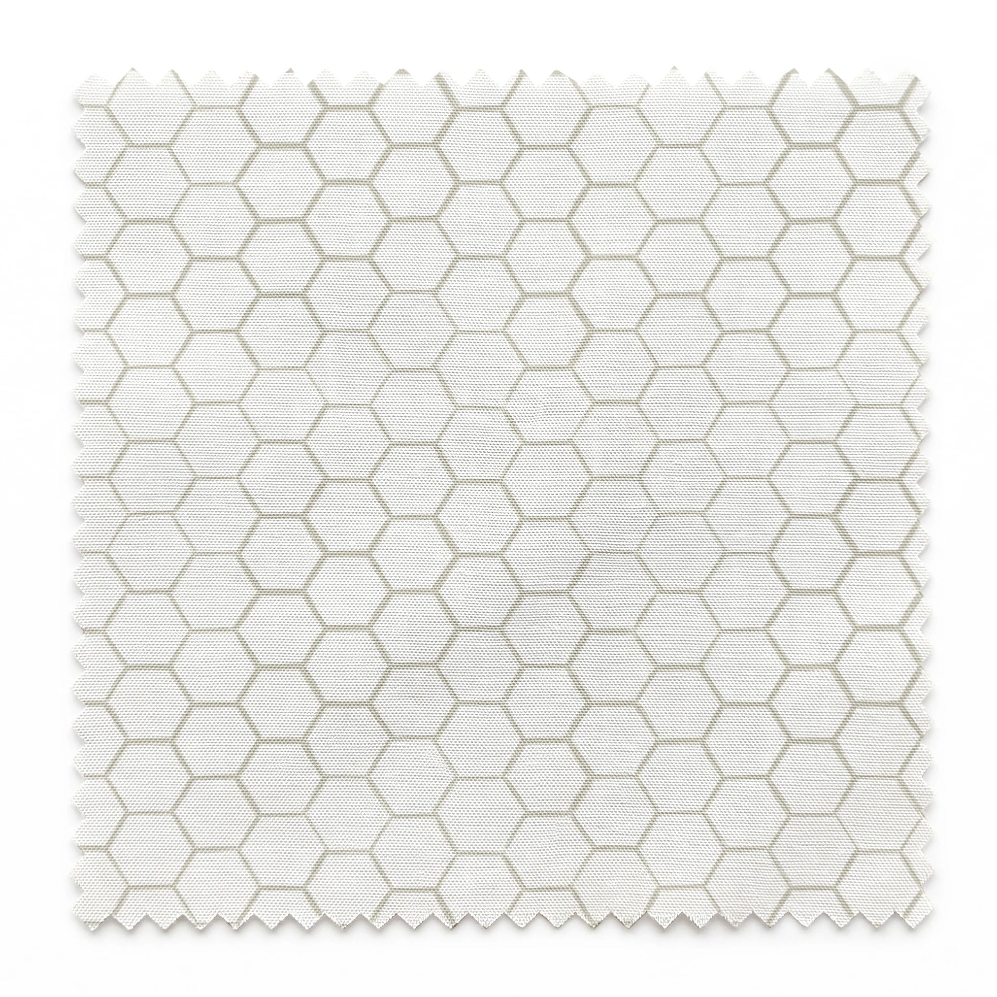 White and beige honeycomb pattern fabric designed by Nicole Tamarin with a subtle, modern farmhouse style. springs swatch pinked
