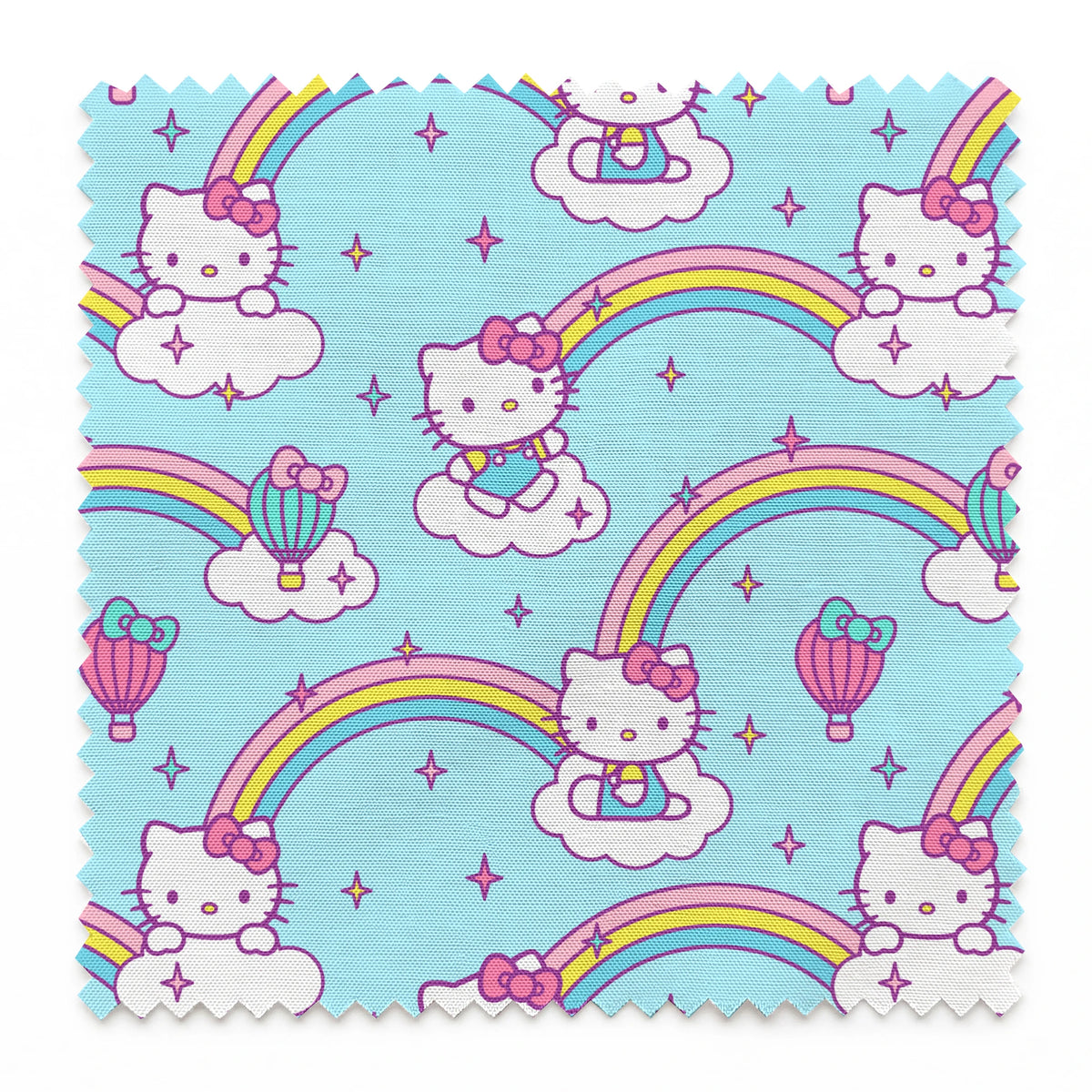 Hello Kitty® Rainbows & Clouds on Blue Fabric