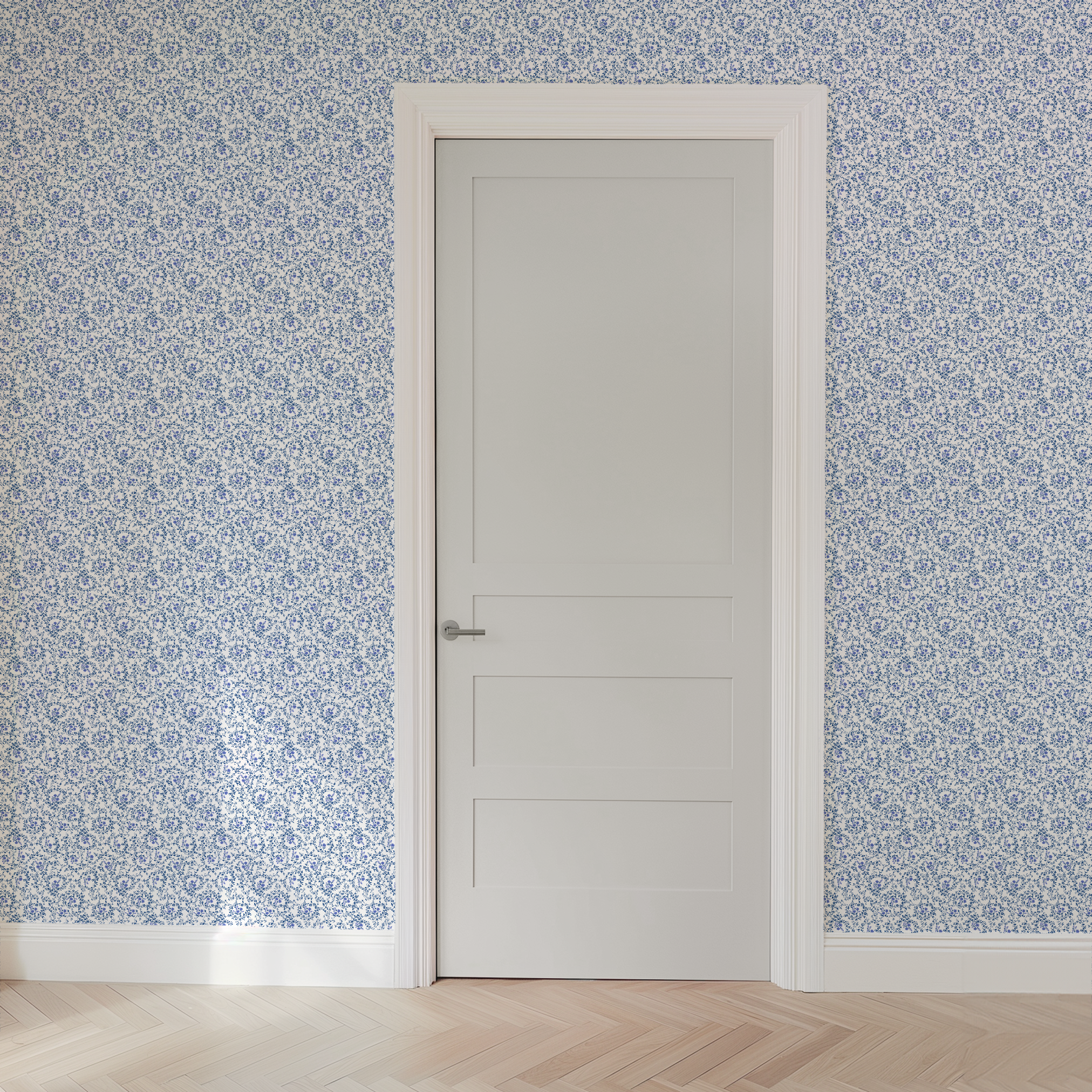 Blue floral motifs interspersed with scroll-like vines on a white background, creating a dense, patterned design. wallpaper door mockup