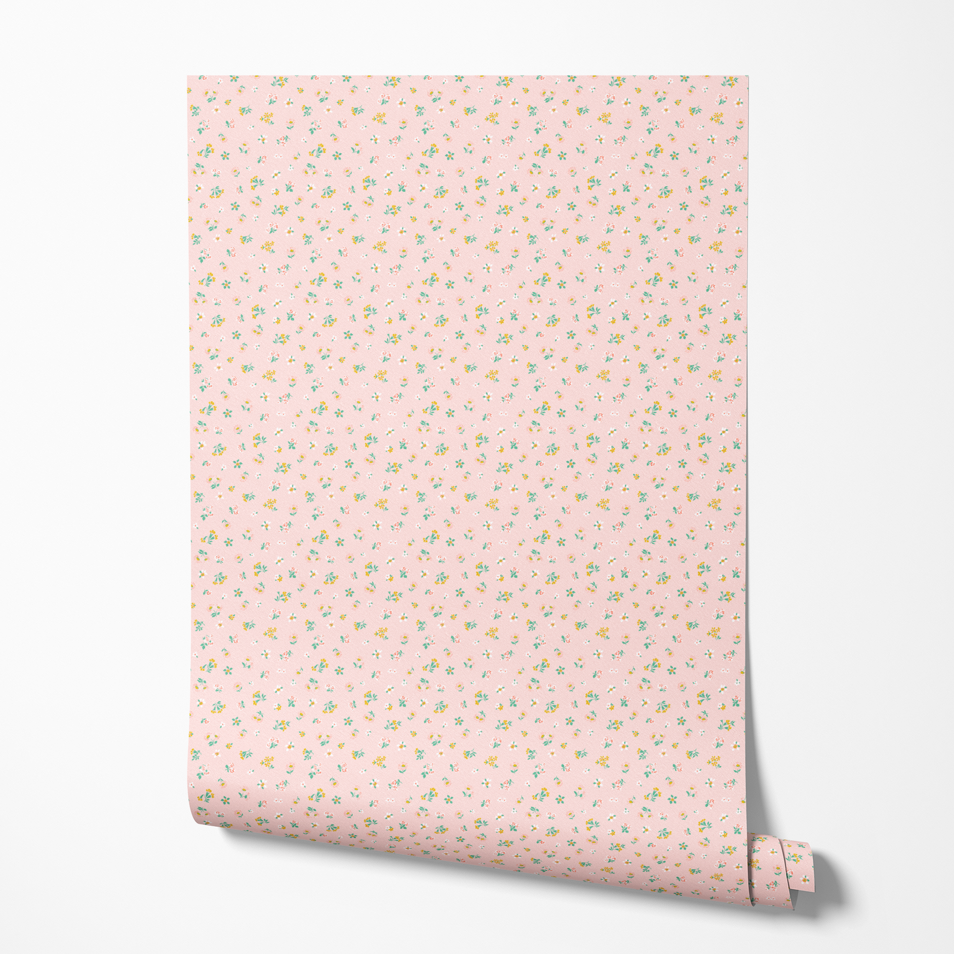 Small floral pattern on pink background with white daisies and yellow, blue, and pink flowers wallpaper roll mockup