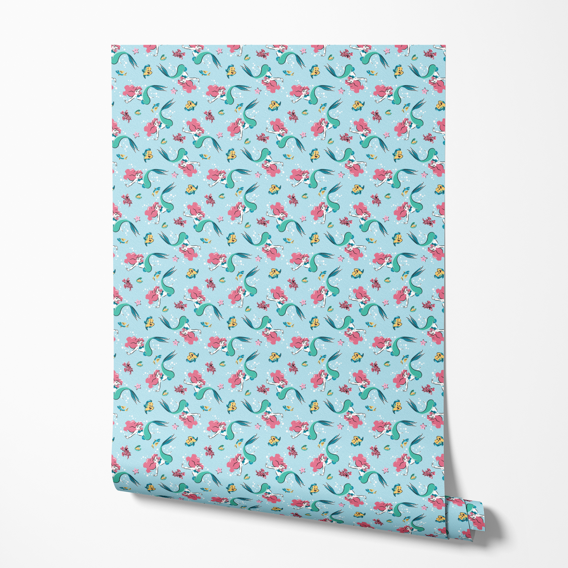 Underwater pattern with colorful mermaids, tropical fish, crabs, and starfish on light blue background wallpaper roll mockup