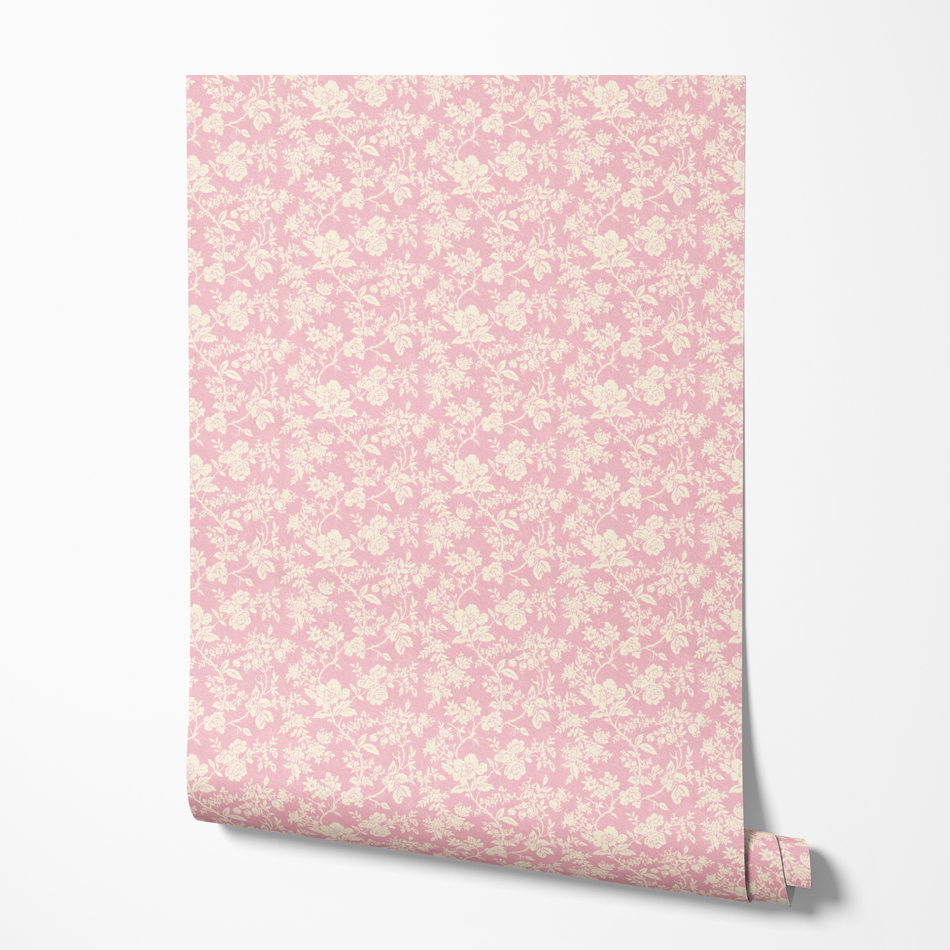 Light pink background with white floral patterns, featuring various flowers and leaves in a delicate, repeating design. wallpaper roll mockup