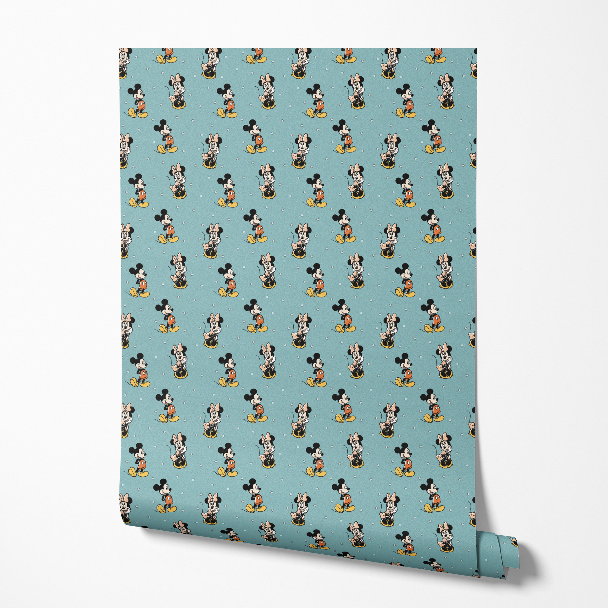 Cartoon pattern of Mickey and Minnie Mouse characters on light blue background with white dots wallpaper roll mockup