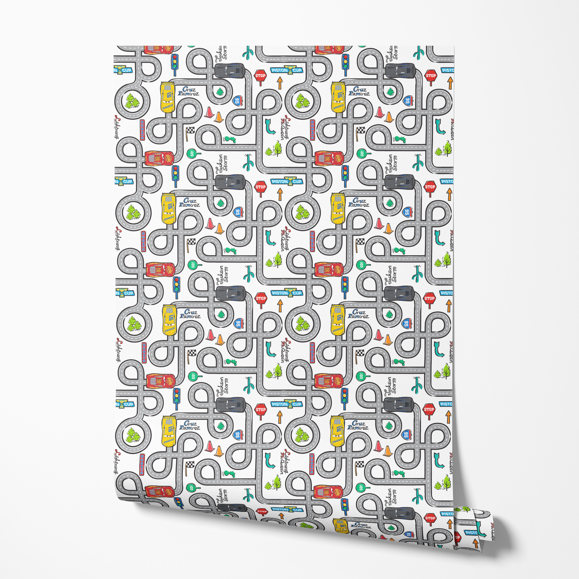 Cartoon road map with cars, traffic signs, and "Cruz Ramirez" label on winding gray streets wallpaper roll mockup