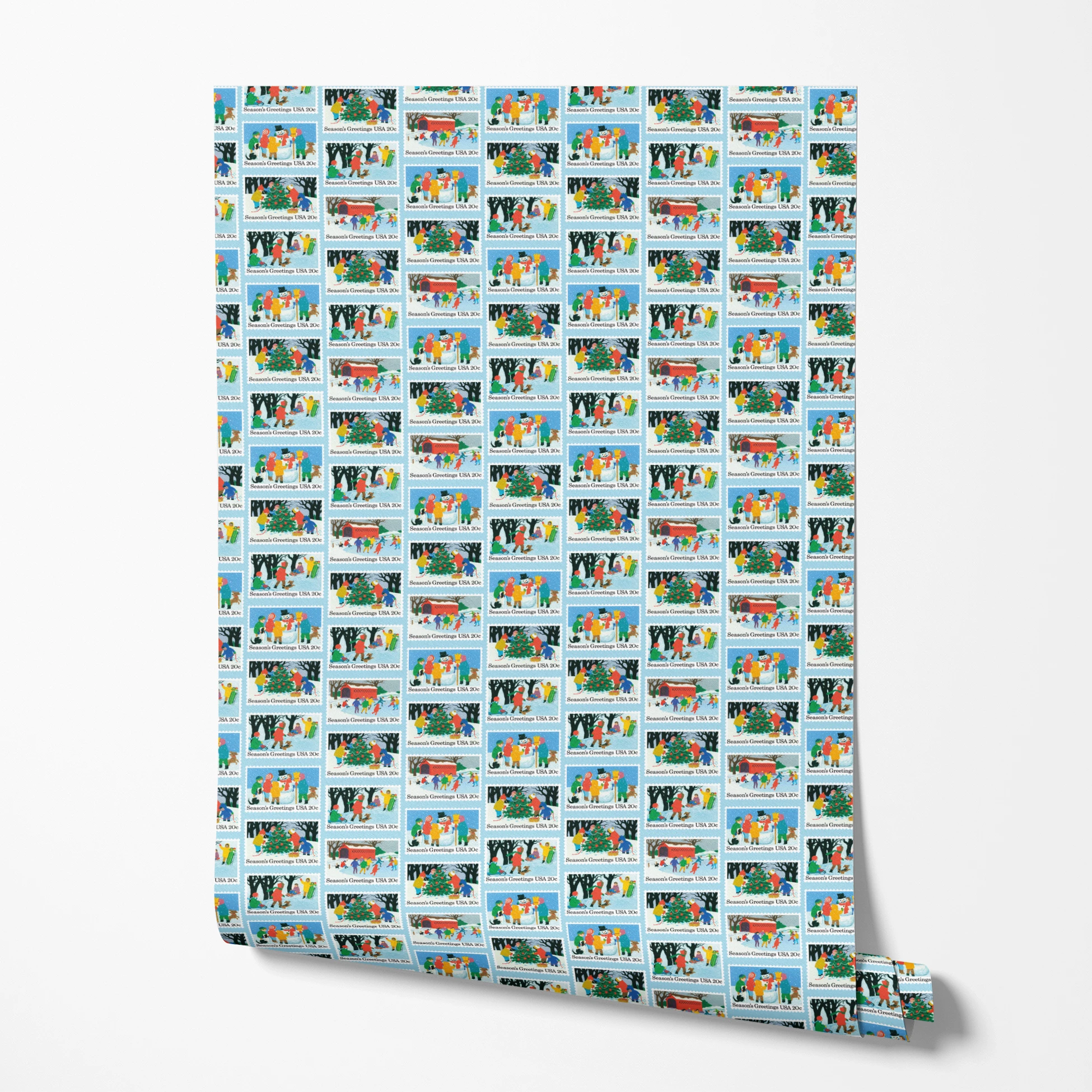 USPS Scenic Season's Greetings Stamps on Blue Wallpaper