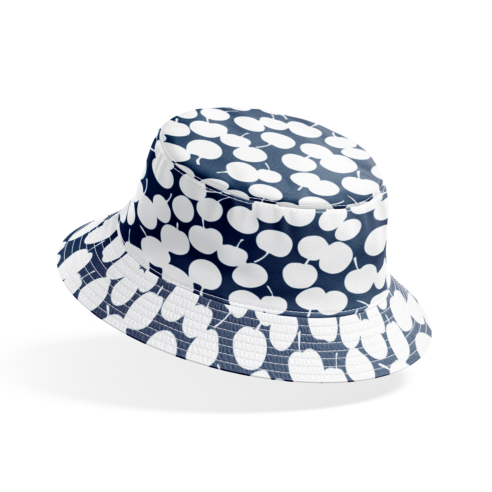 White cherry silhouettes scattered across a deep navy blue background in a playful pattern bucket hat mockup