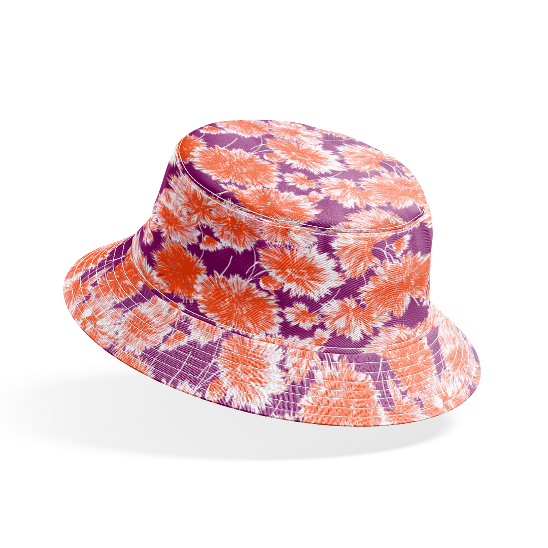 Vibrant floral pattern with orange and white chrysanthemum-like blooms on deep purple background bucket hat mockup
