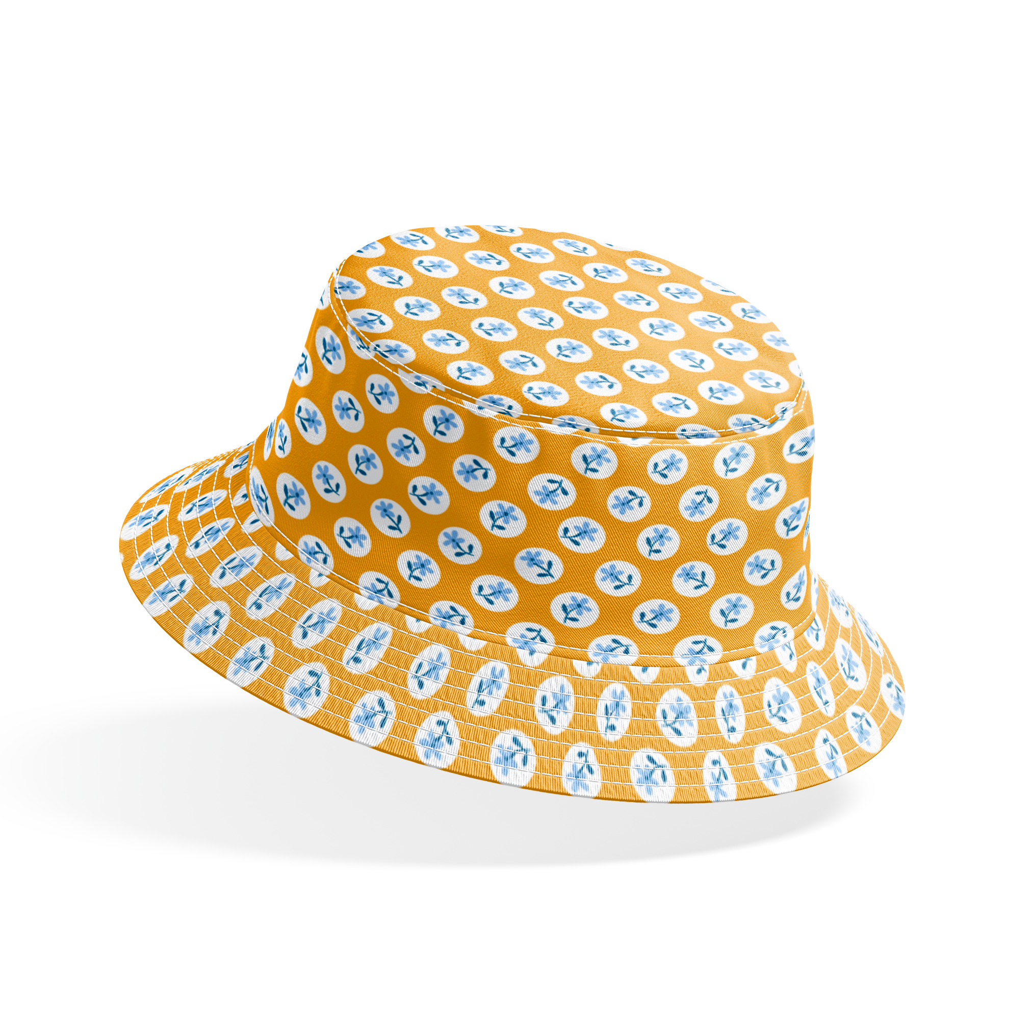 Light blue flowers with navy stems in white circles on a mustard yellow background bucket hat mockup