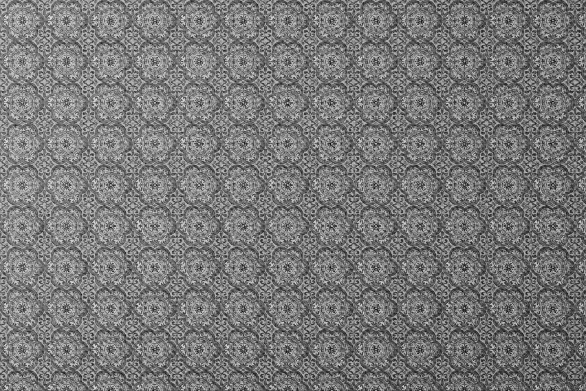 Grayscale medallion tile pattern with floral and scroll motifs in a symmetrical layout by Nicole Tamarin. designs flat mockup