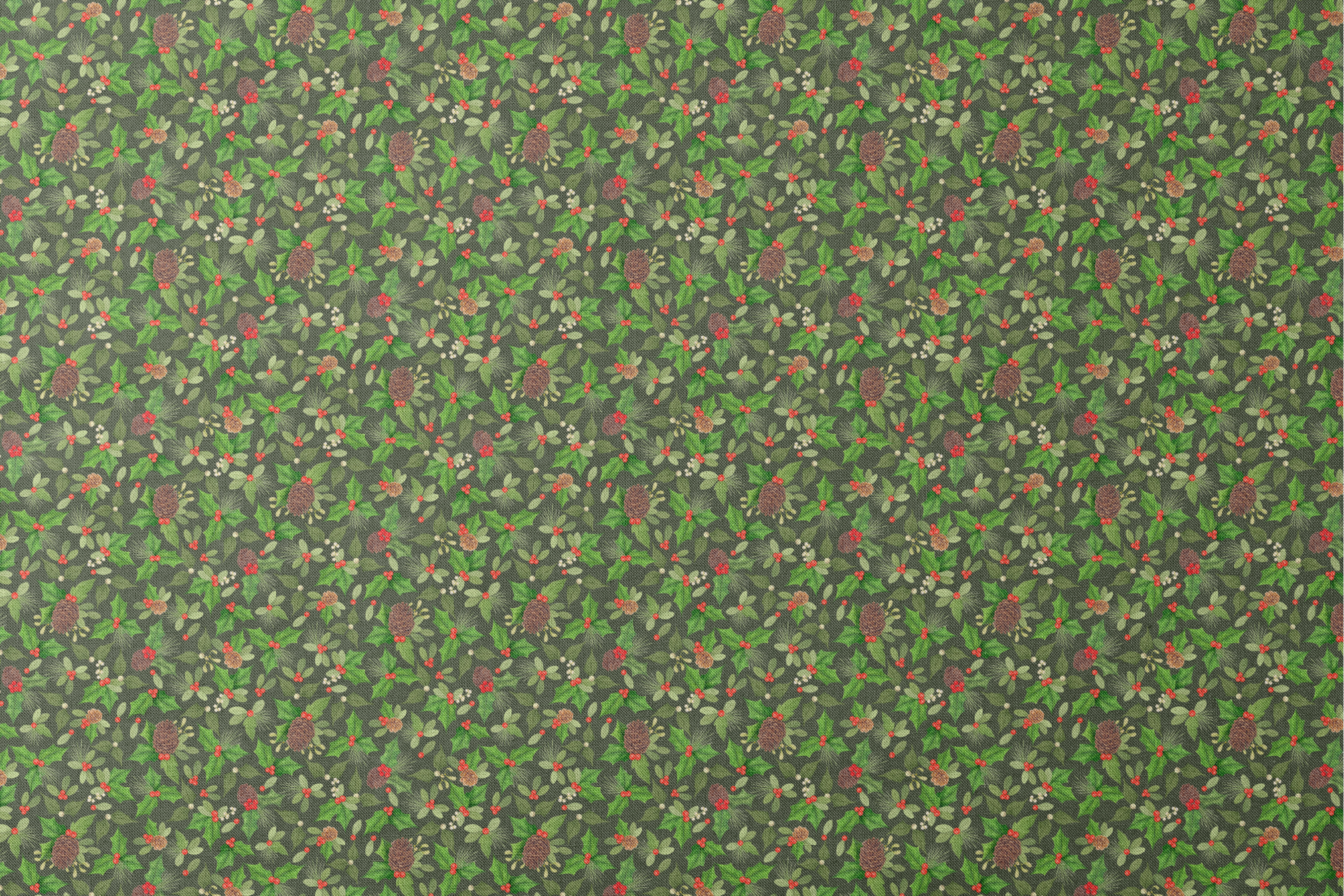 Seamless holiday pattern by Nicole Tamarin featuring pinecones, holly, red berries, and green foliage on a dark green background. designs flat mockup