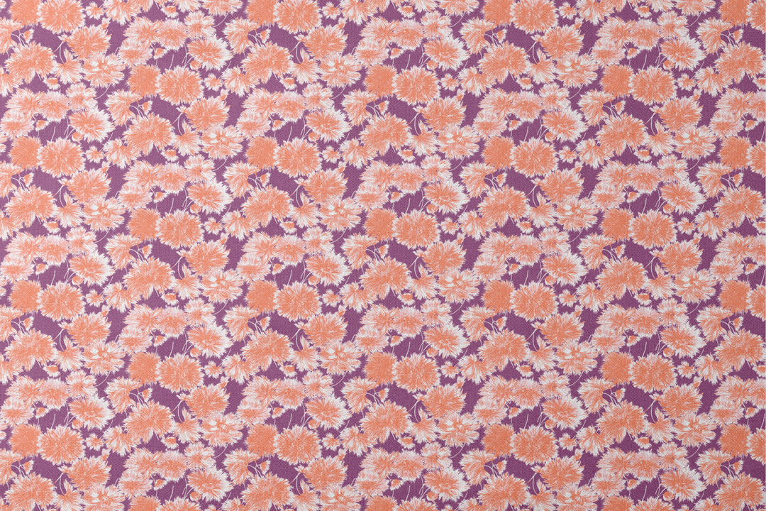 Vibrant floral pattern with orange and white chrysanthemum-like blooms on deep purple background designs flat mockup