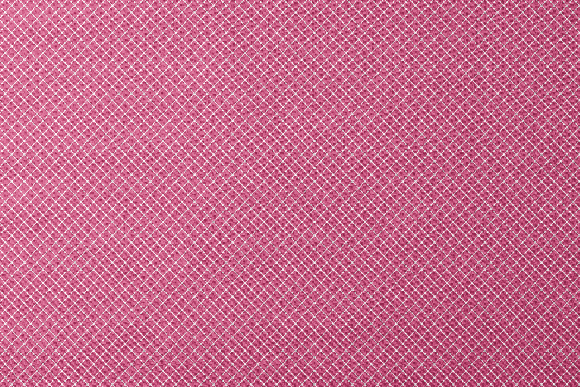 Pink quatrefoil pattern with white outlines forming a Moroccan-style geometric design designs flat mockup