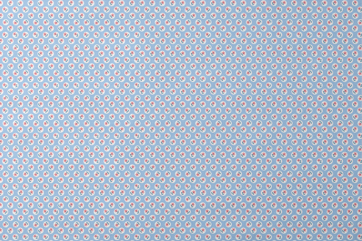 Pink flowers with blue-green stems in white circles on pale blue background, repeating pattern designs flat mockup