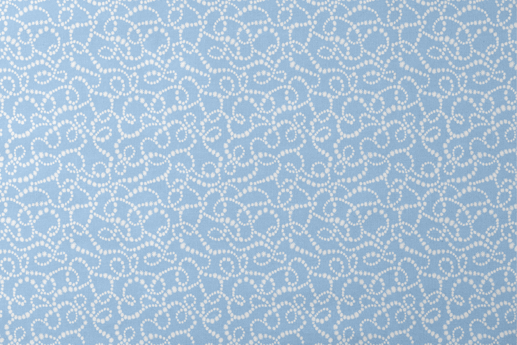 Pale blue background with white dotted swirling pattern resembling strings of pearls or bubbles in abstract curves designs flat mockup
