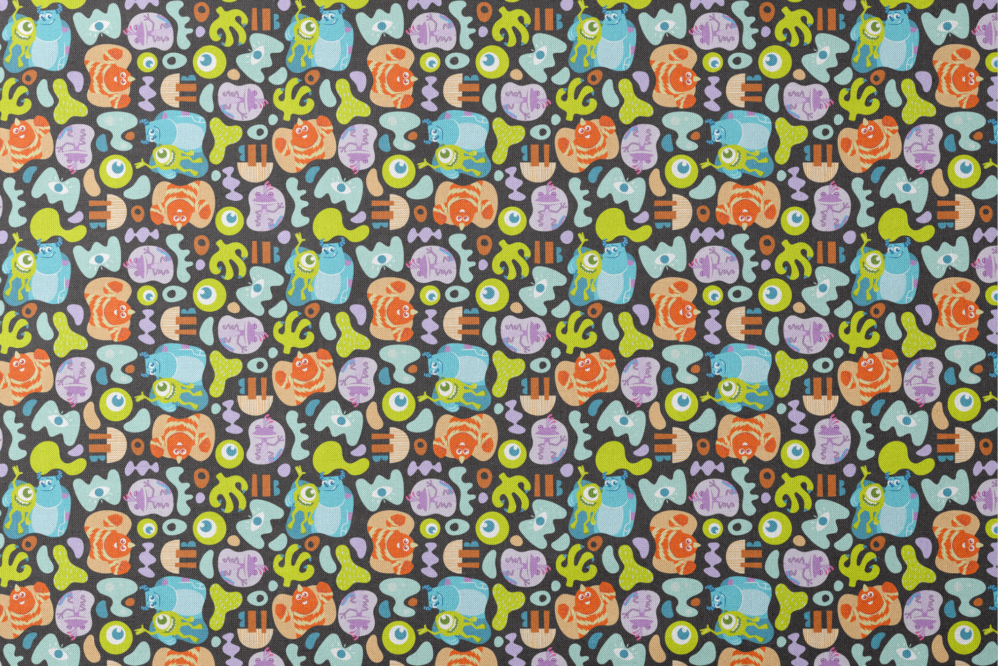 Colorful Monsters Inc pattern with Mike, Sulley and other characters on black background designs flat mockup