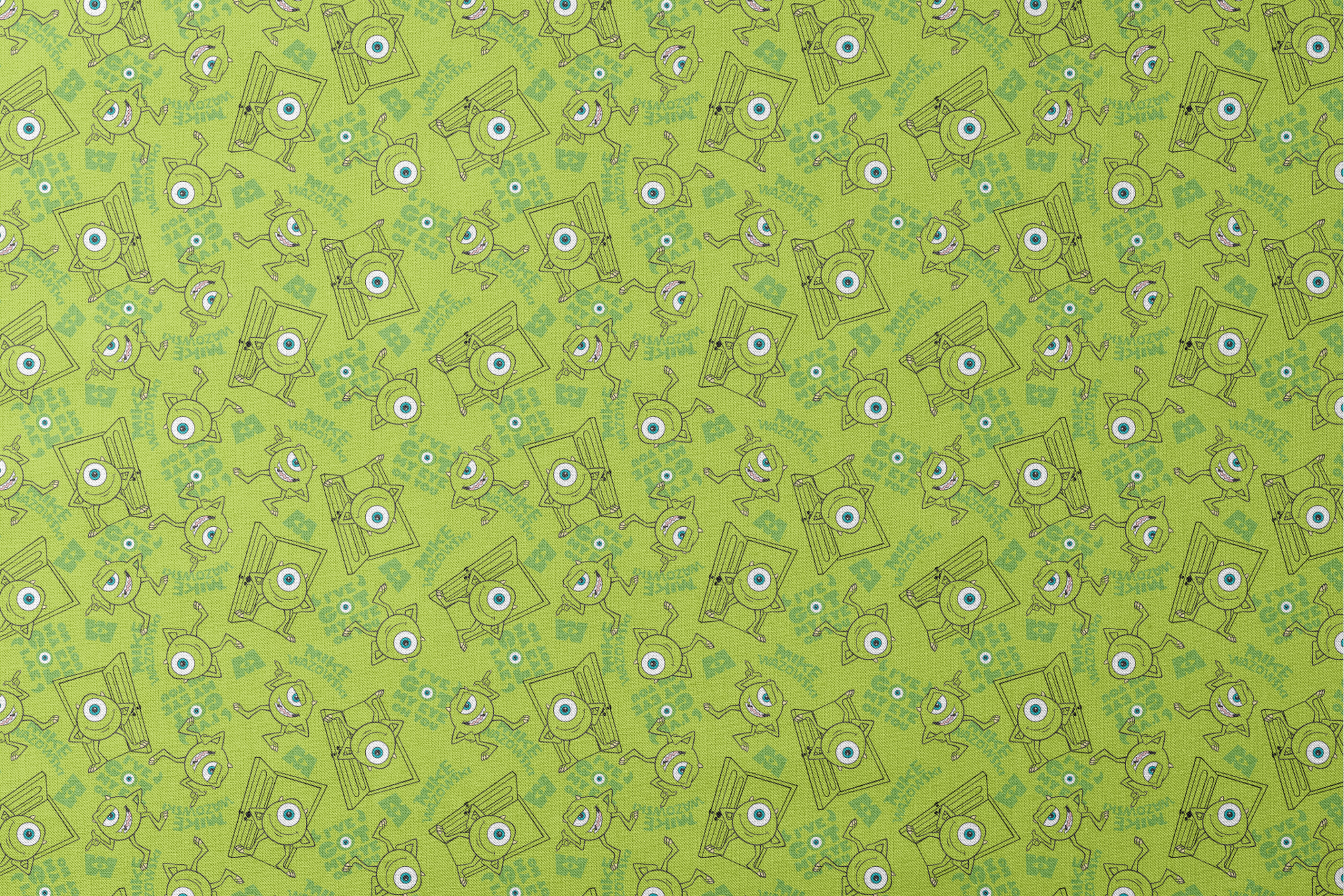 Green background with repeating Mike Wazowski in black outlines. designs flat mockup