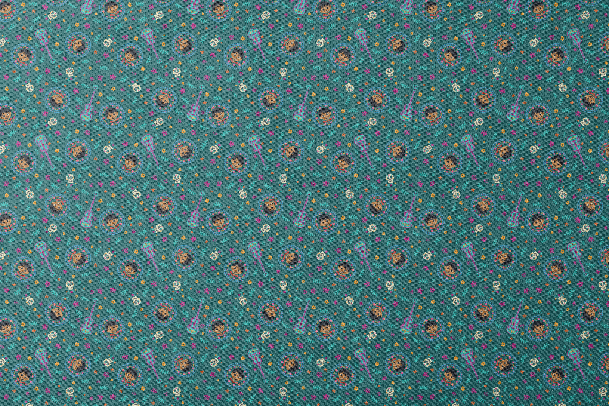 Colorful Coco-inspired pattern with guitars, sugar skulls, circular portraits, and floral elements on teal background. designs flat mockup