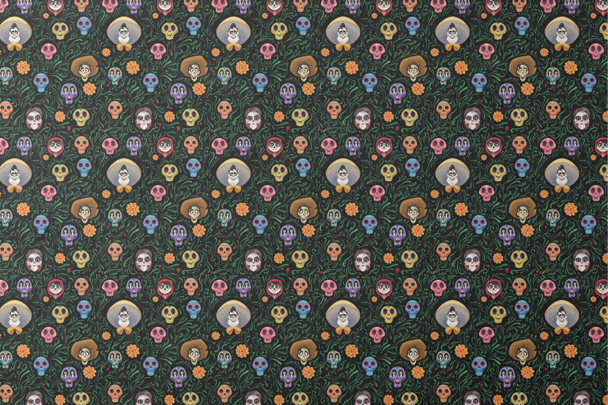 Colorful Coco stylized sugar skulls with sombreros scattered among green vines and orange flowers on black background designs flat mockup