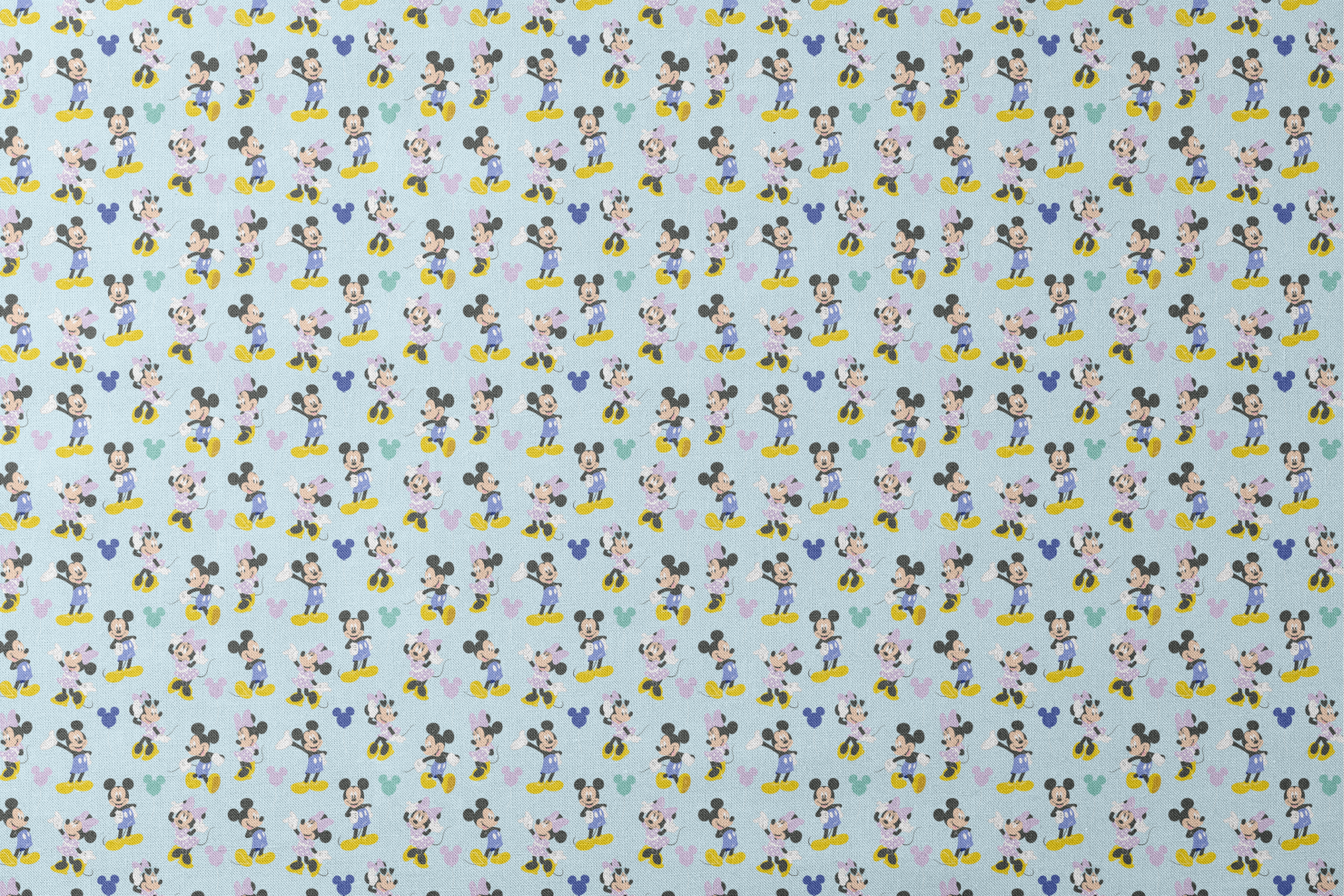 Pattern of Mickey and Minnie Mouse characters in various poses on light blue background designs flat mockup