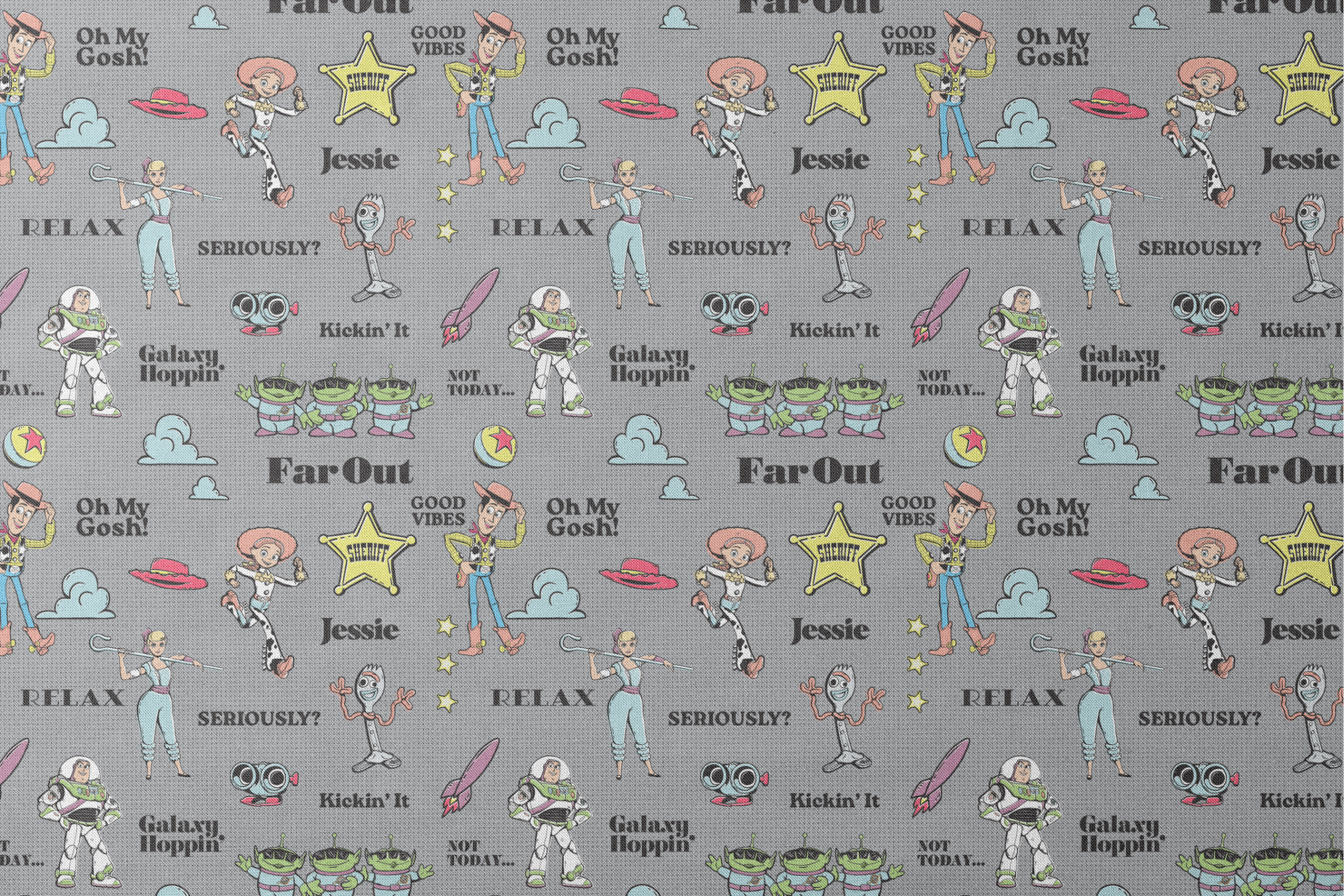 Toy Story character pattern with Buzz, Woody and aliens on gray background with phrases like "Good Vibes" and "Galaxy Hoppin' designs flat mockup
