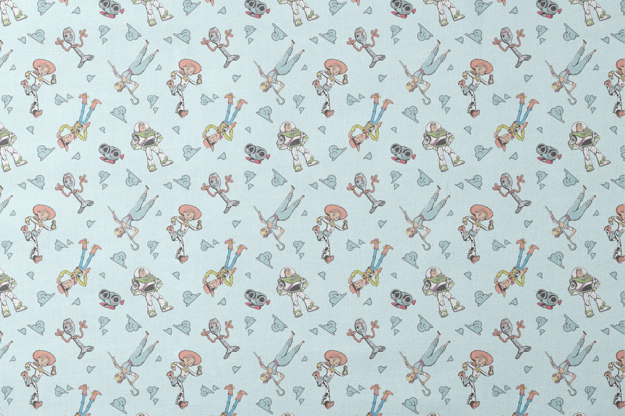 Cartoon characters from "Toy Story" floating on light blue background with cloud patterns designs flat mockup