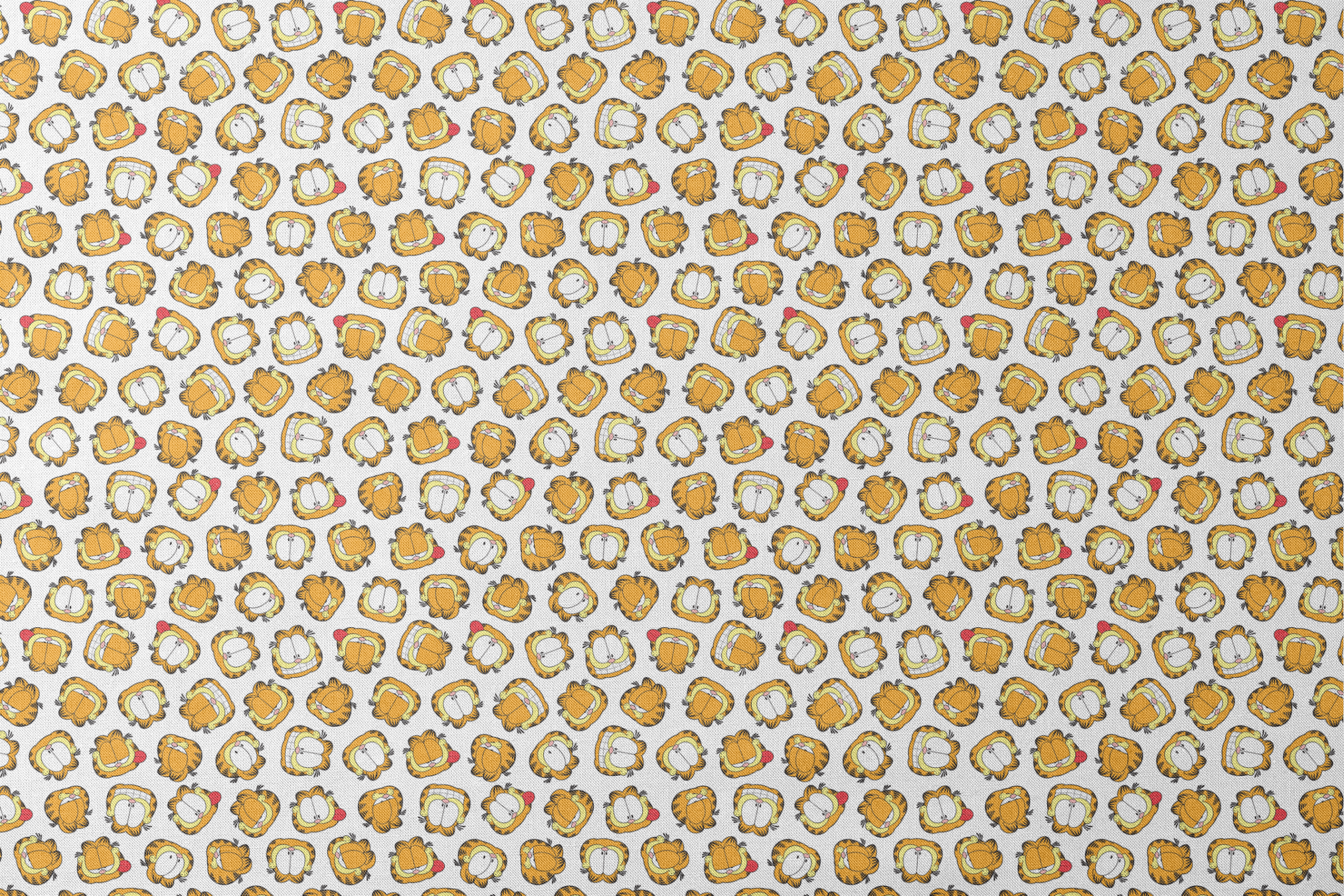 Pattern of cartoon cat faces with orange and yellow coloring against white background designs flat mockup