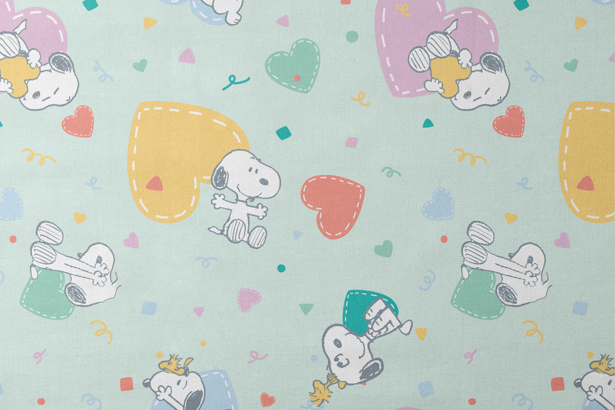 Cartoon Snoopy pattern with colorful hearts on mint green background, featuring different Snoopy poses designs flat mockup