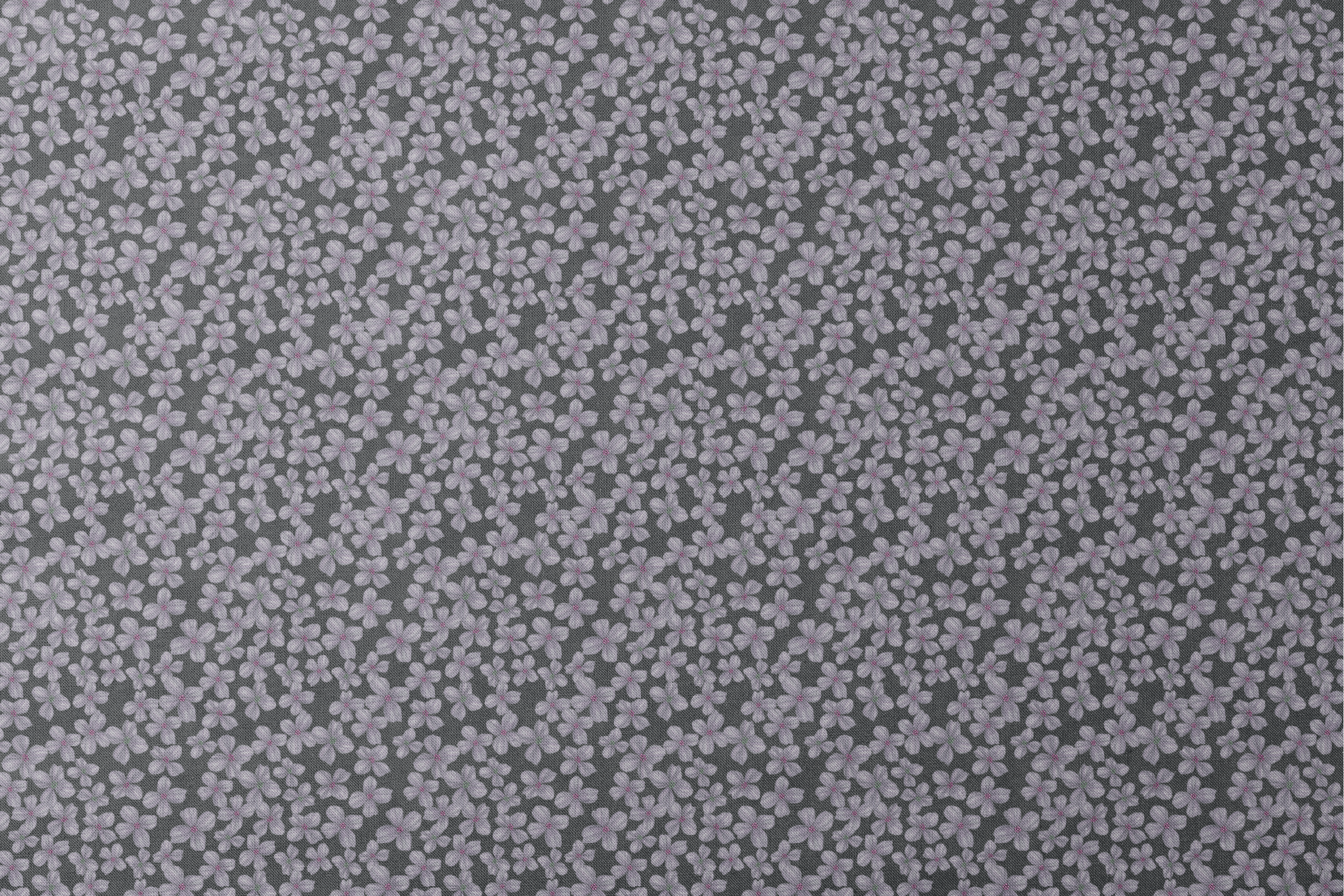 Hand-drawn purple flowers scattered on a charcoal background, designed by Nicole Tamarin. designs flat mockup