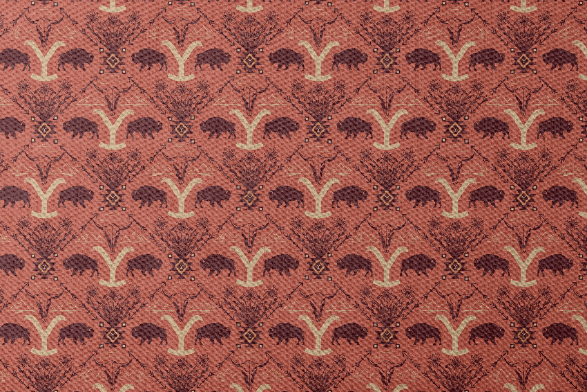 Terracotta and burgundy Yellowstone design with buffalo, skulls, wildflowers, and Western motifs. designs flat mockup